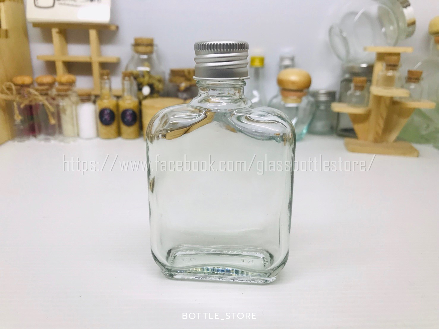 ขวดแก้ว แบน 85ml ฝาเกลียวสีเงิน