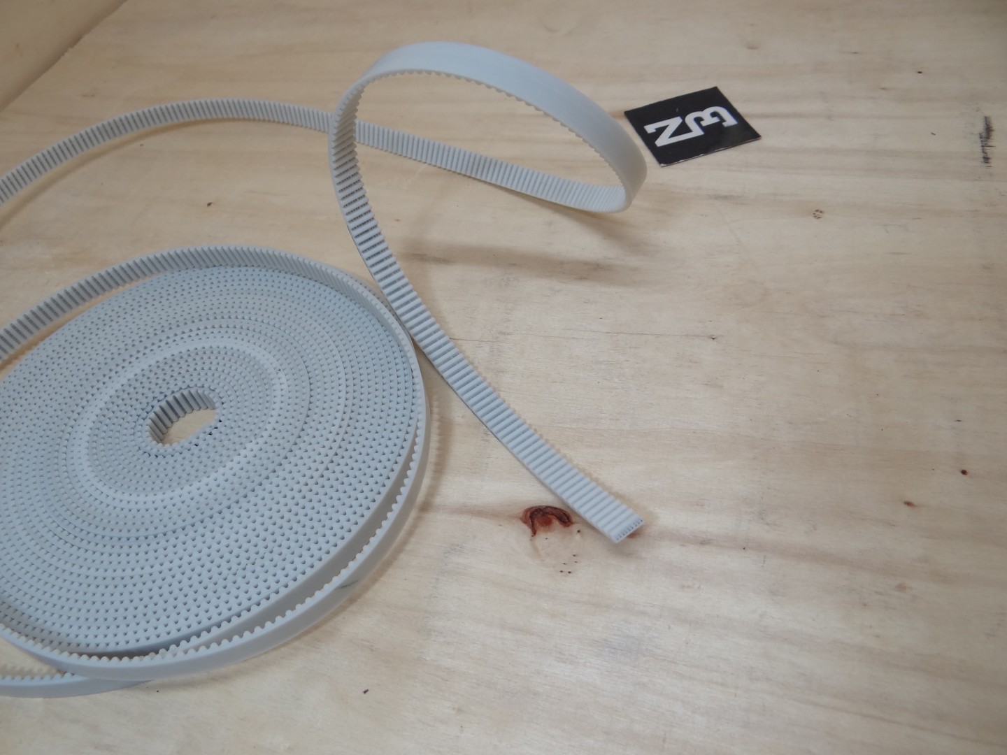 HTD-3M-10mm PU Timing Belt Steel Core สีขาว (สานแถบเส้นเหล็กในสายพาน ราคา/1เมตร)