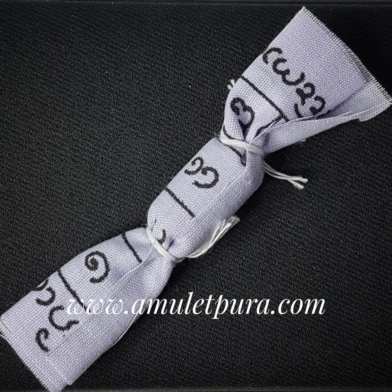 ตะกรุดผูกข้อมือเด็ก หลวงพ่อวิชัย สำนักสงฆ์พุทธมงคล จ.แม่ฮ่องสอน