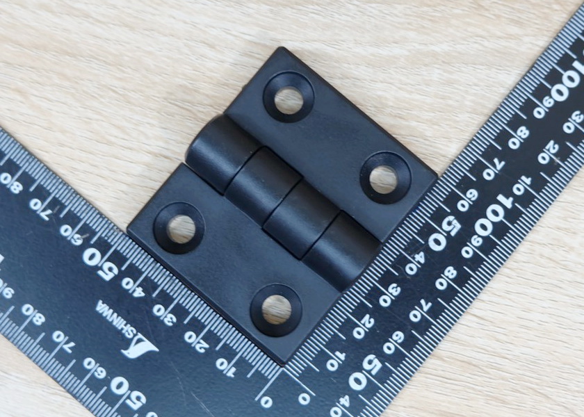 บานพับพลาสติกไนลอน Hinge for Alu-Profile 4040 ระยะรู 40x30 mm