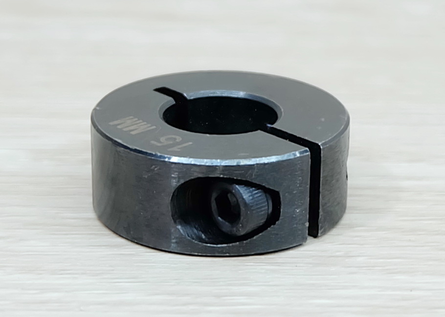 SCS 15x34x13 mm (IDxODxThickness) 45 Steel - Open type optical axis fixing ring