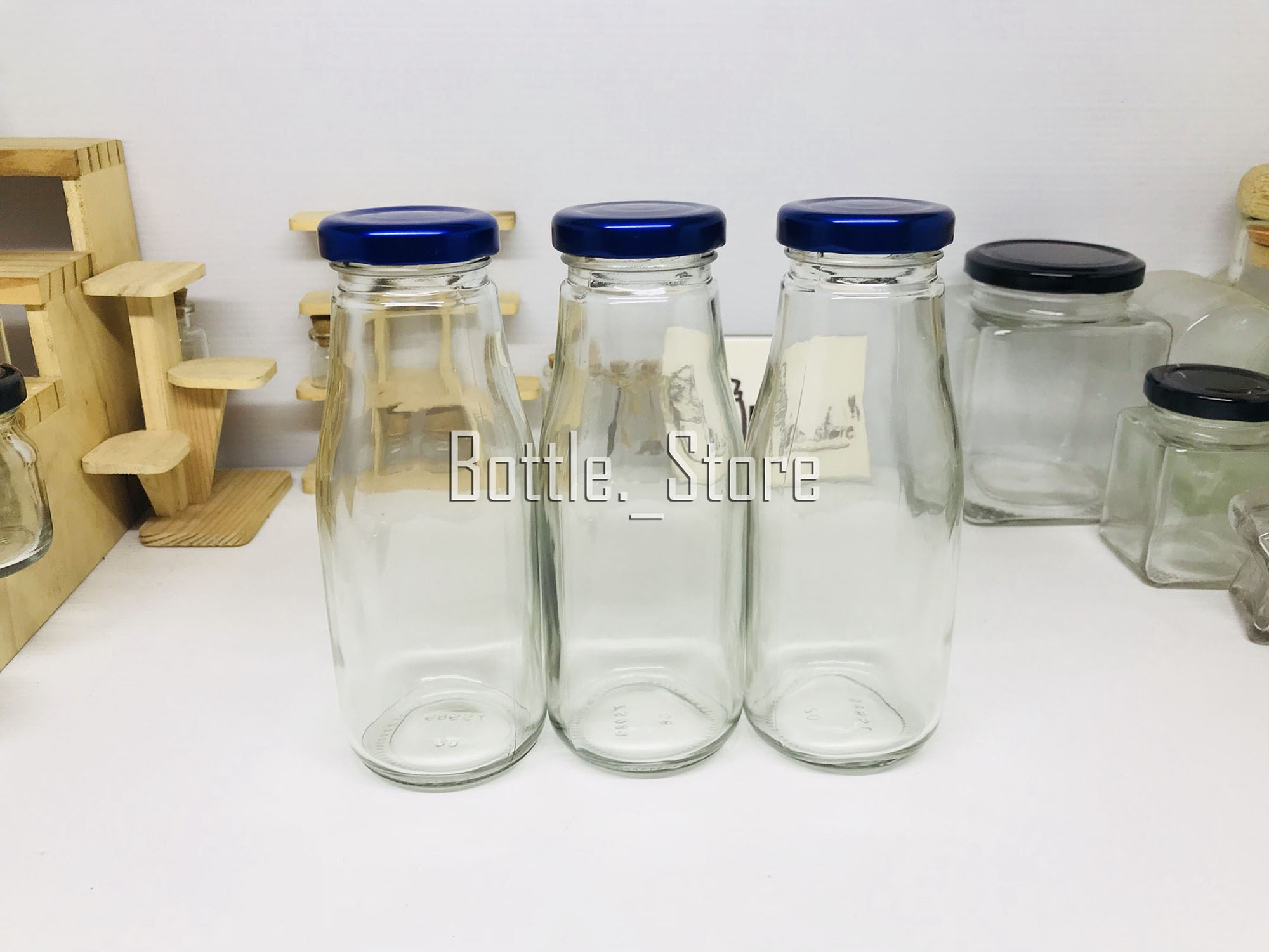 ขวดแก้ว น้ำผลไม้ 250ml ฝาเกลียวล็อคสีน้ำเงิน