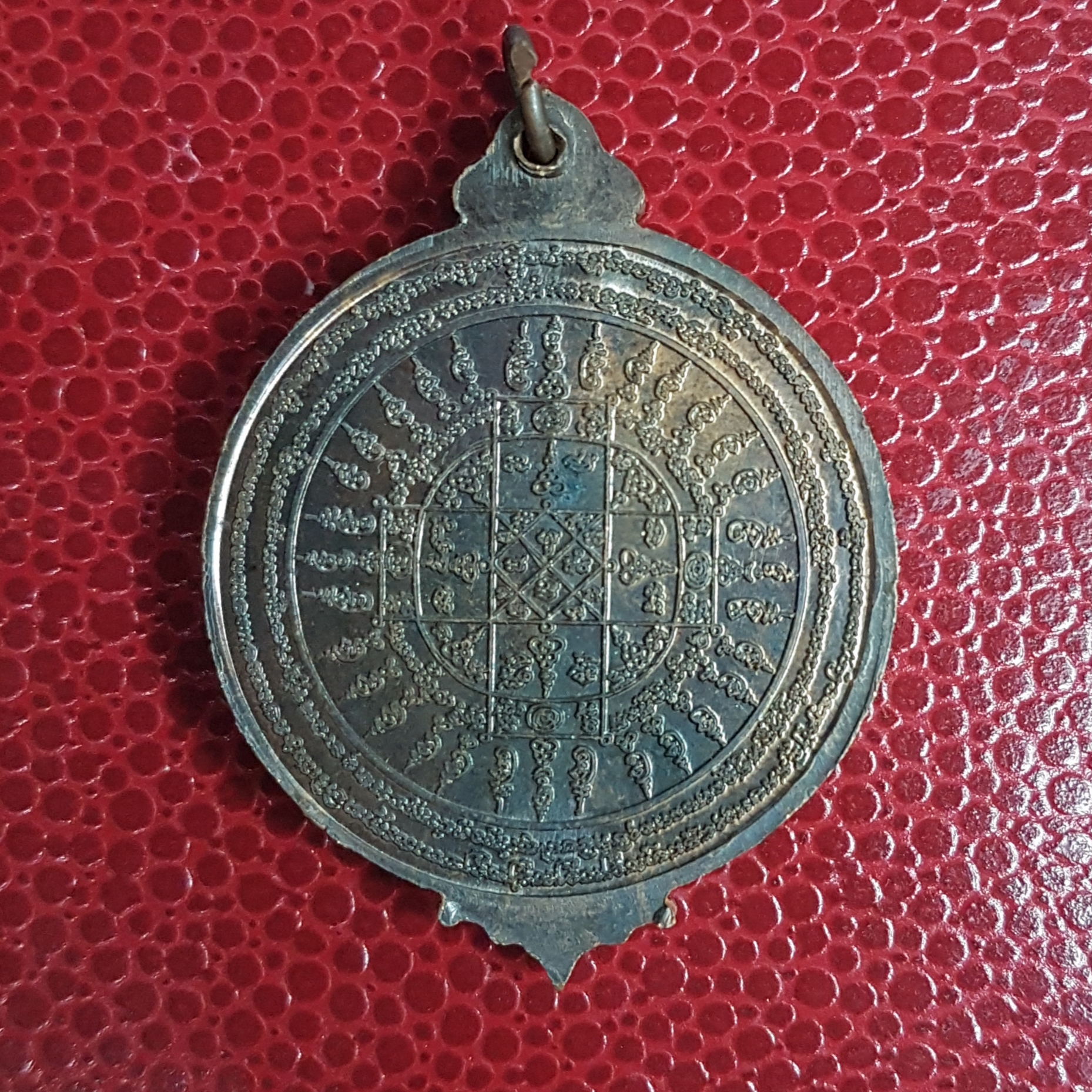 เหรียญกลมหน้าหนุมานหลังยันต์ อ.ธรรมนูญ บุญธรรม สำนักสักยันต์บัวแปดกลีบ(ท่านย่าเฒ่า)จ.ชลบุรี