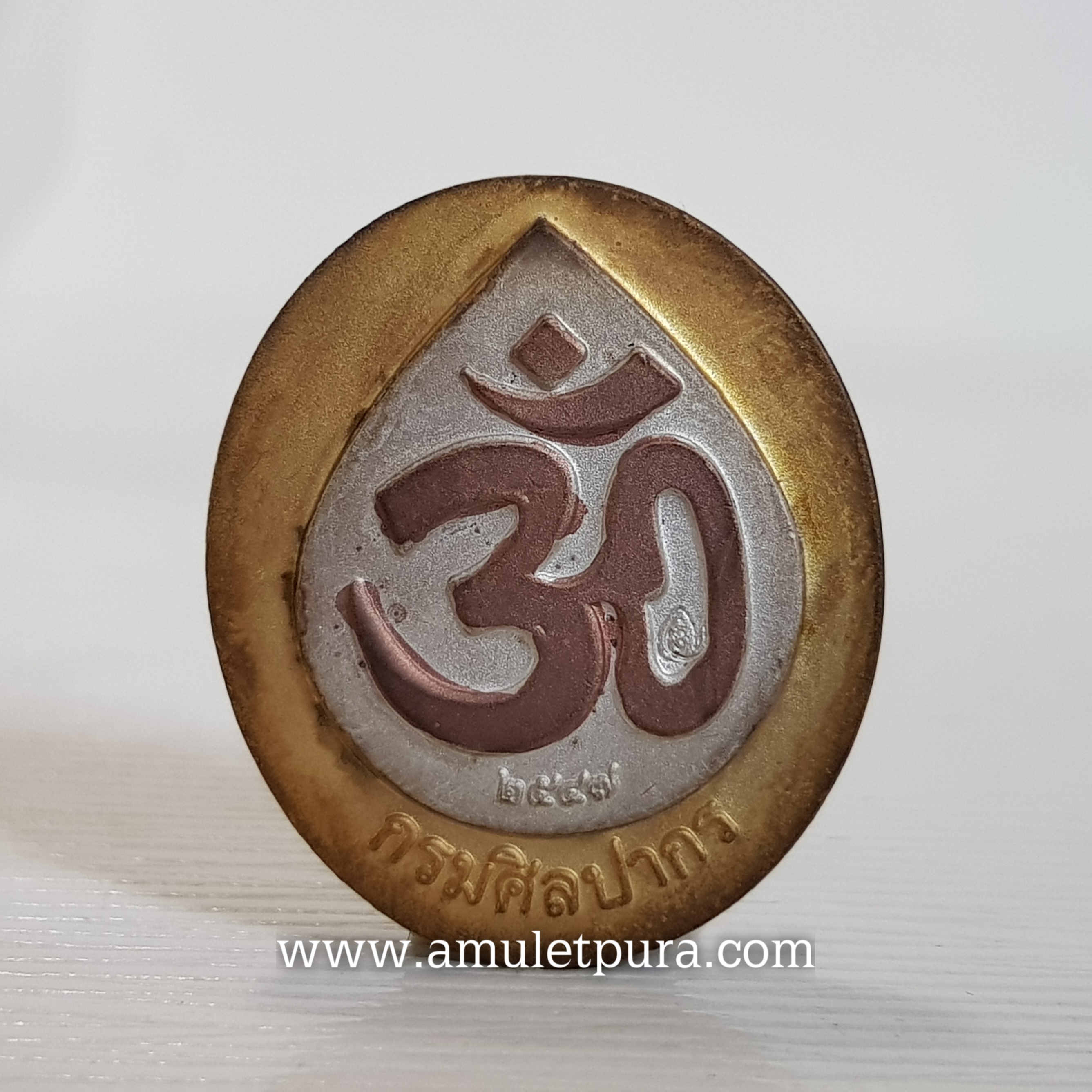 เหรียญพระพิฆเนศวร์ ปี47 กรมศิลปากร กรุงเทพมหานคร(โลหะชุมสามกษัตริย์พื้นทอง ตอกโค้ดหลังเหรียญ)