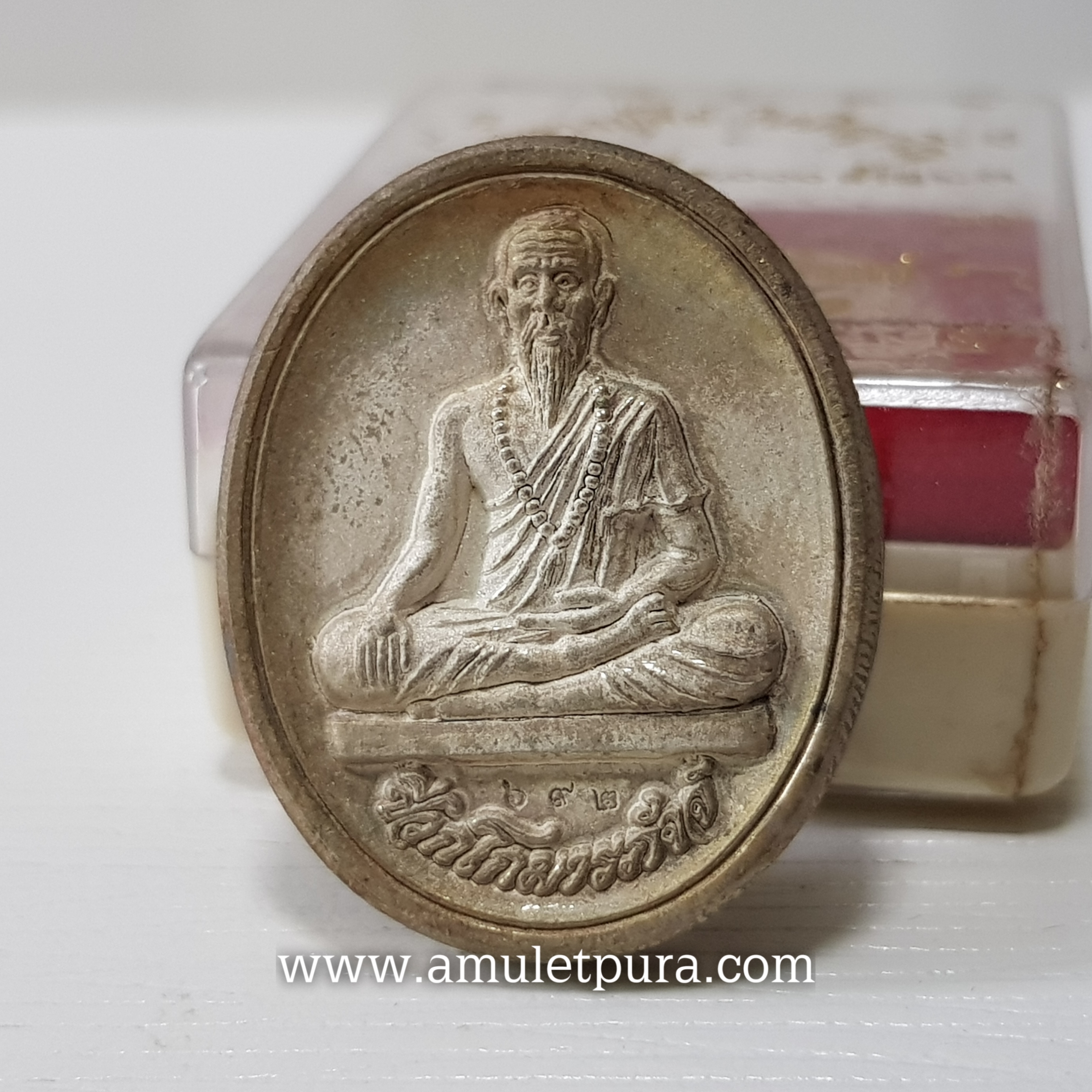 เหรียญหมอชีวกโกมารภัจจ์ หลังพระพิฆเณศ(สัมฤทธิ์ชุบเงินพ่นทราย)รุ่นเศรษฐี 1,000 ล้าน ปี51 หลวงปู่คีย์ วัดศรีลำยอง จ.สุรินทร์ (ตอกโค้ด หมายเลข 692)