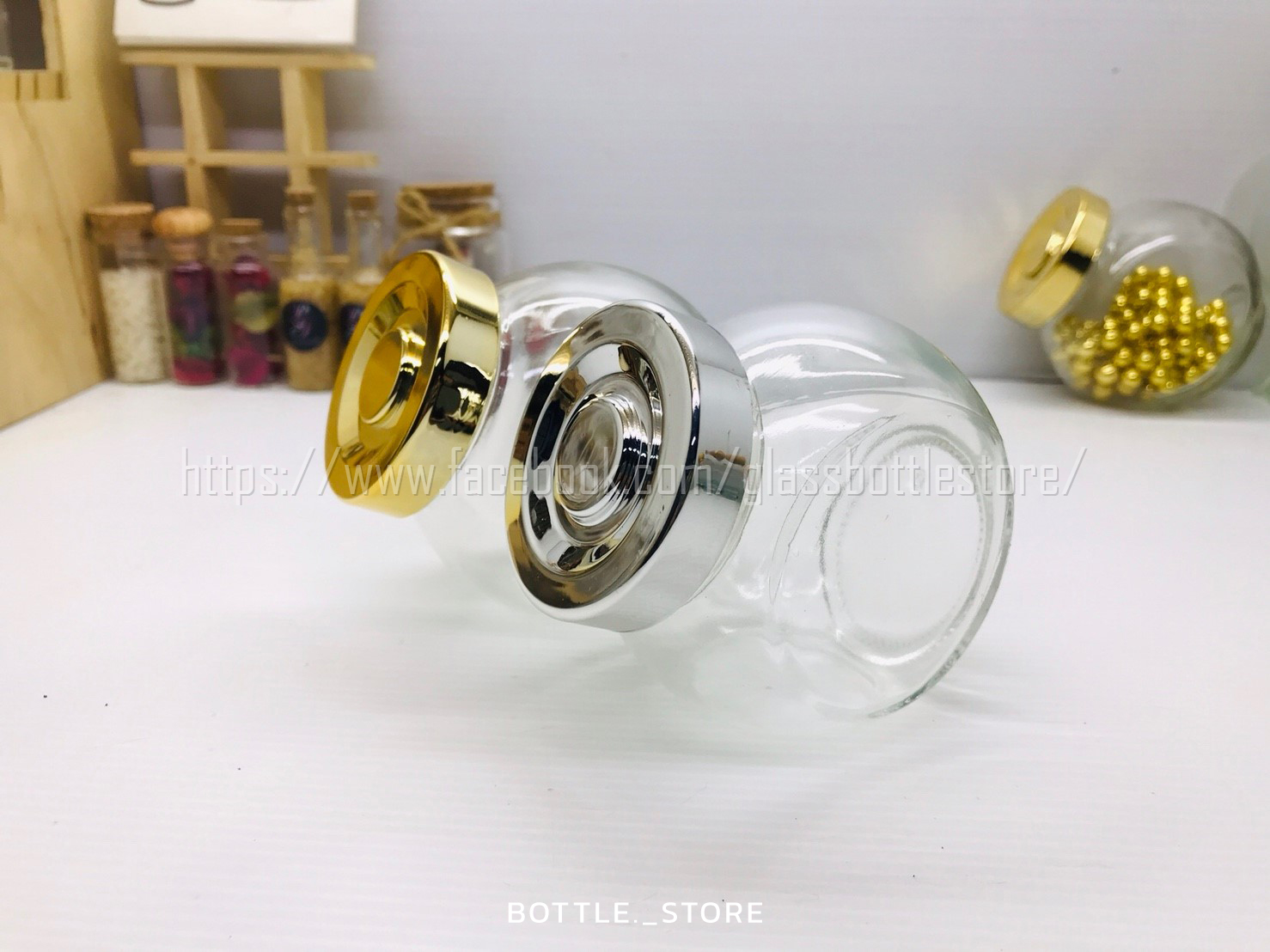 ขวดแก้ว กลมเอียง 180ml ฝาเกลียวสีเงิน