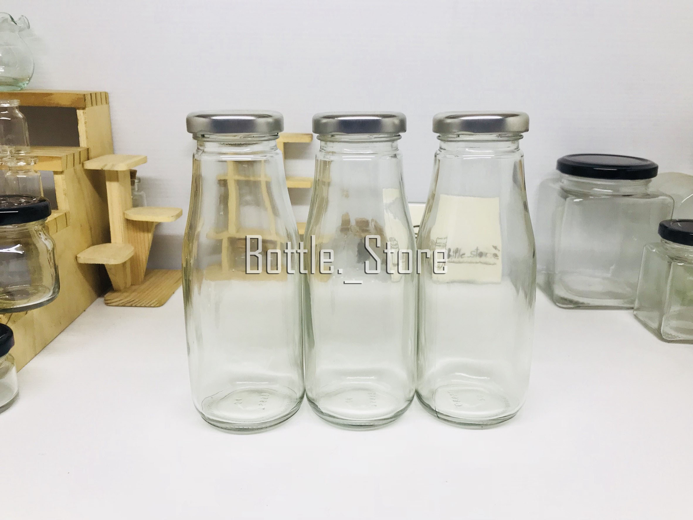ขวดแก้วน้ำผลไม้ 250ml เกลียวล็อคฝาสีเงิน