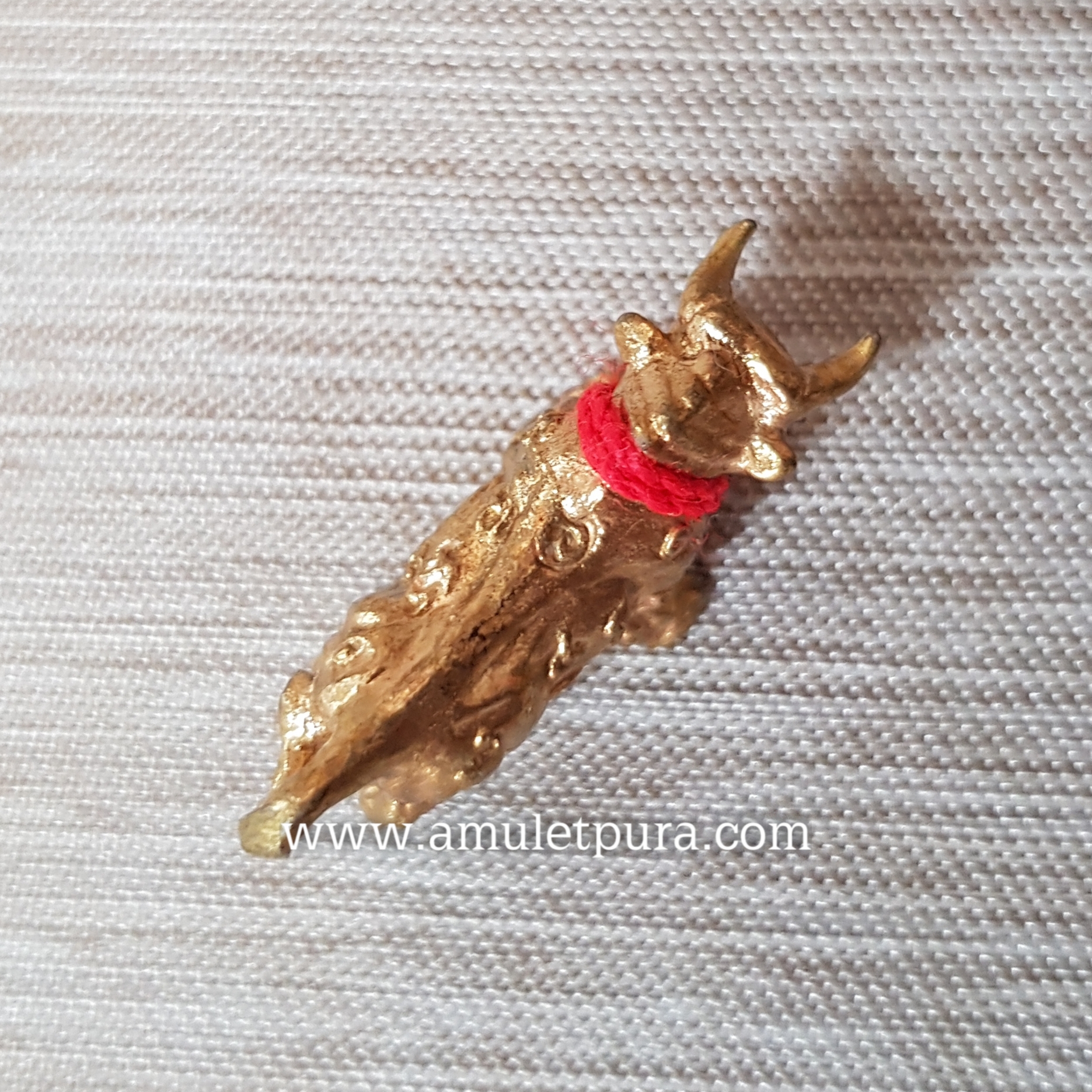 วัวธนูสาลิกา (เนื้อทองผสมชนวนพระกริ่ง) ปี55 หลวงปู่นิ่ม วัดพุทธมงคล จ.สุพรรณบุรี (ตอกโค้ด)