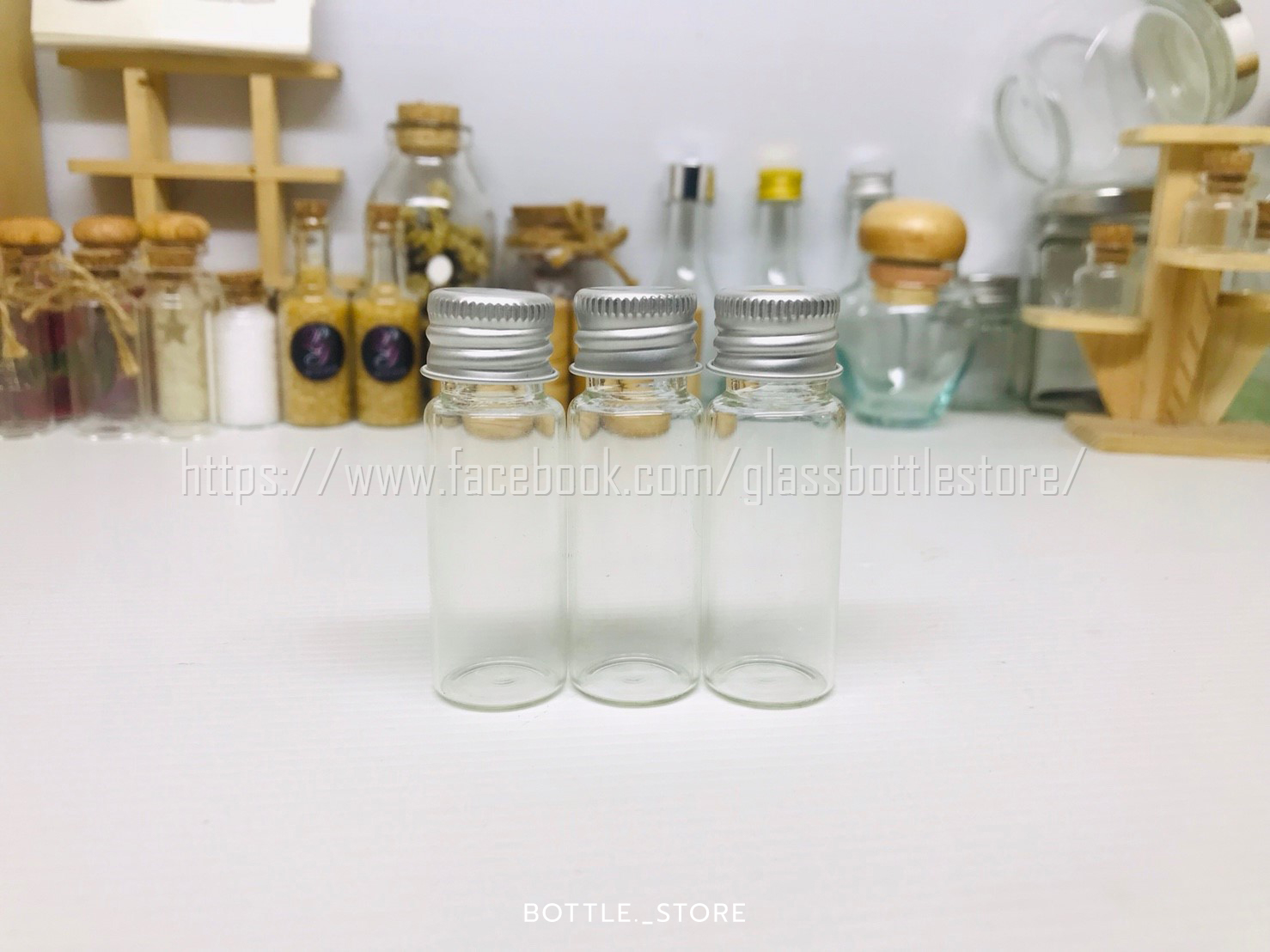 ขวดแก้ว กลม 10ml สีใสฝาเงิน