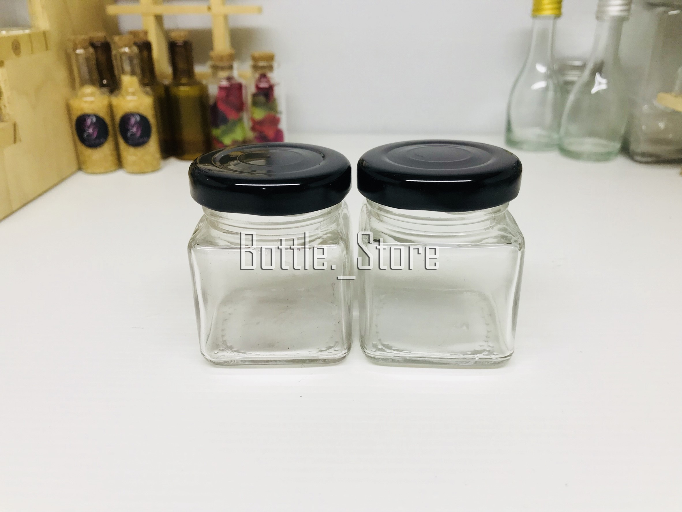 ขวดแก้ว สี่เหลี่ยม 50ml ฝาเกลียวล็อคสีดำ