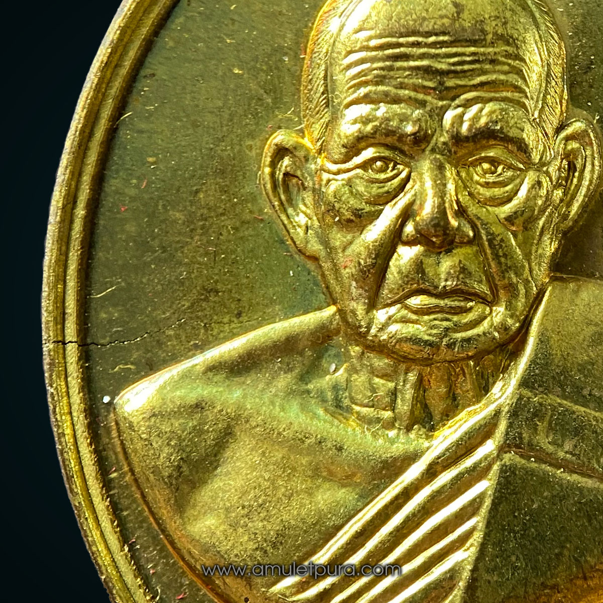 เหรียญโภคทรัพย์ หลังครุฑ เนื้อทองทิพย์ รุ่นแรก ปี54 หลวงปู่ผาด วัดไร่ จ.อ่างทอง (มีโค้ด หมายเลข 65)