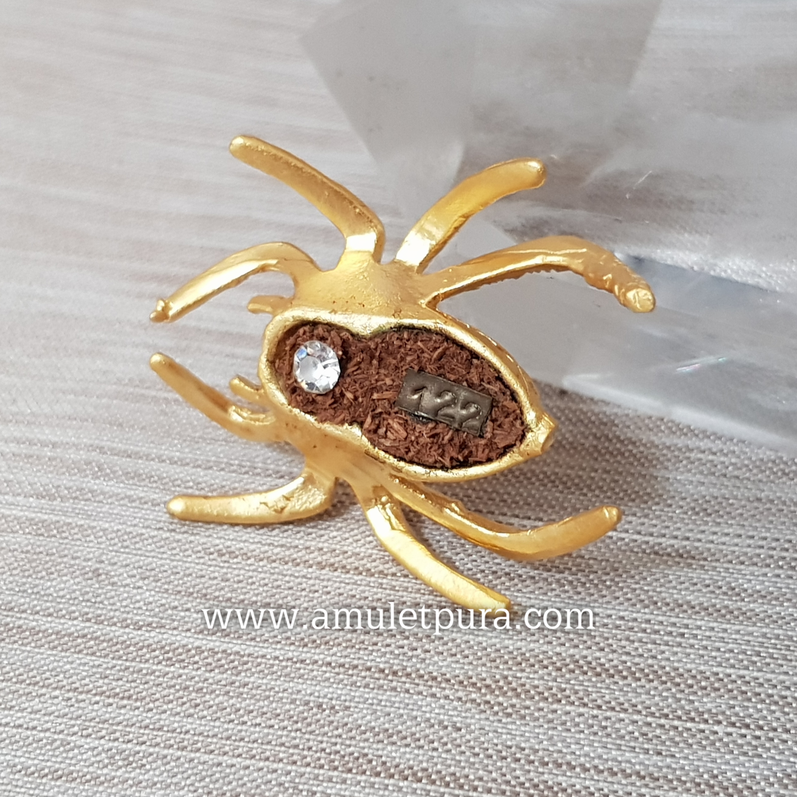 แมงมุมมหาลาภ รุ่นไหว้ครู(อุดผงพุทธคุณฝังพลอย)ปี54 หลวงพ่อวัชระ วัดถ้ำแฝด จ.กาญจนบุรี(มีหมายเลข 122)