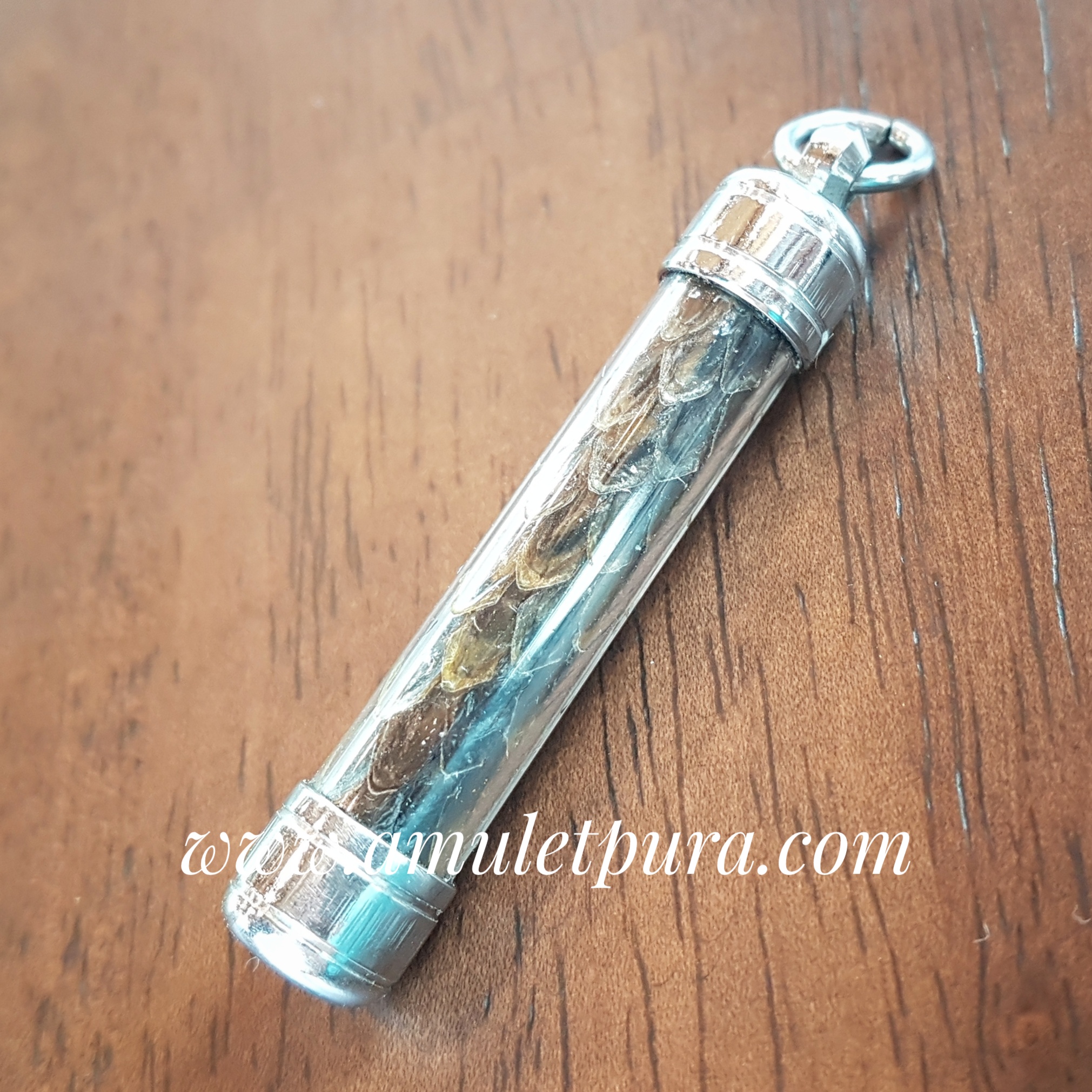 ตะกรุดหนังพญางูเหลือมเขมือบทรัพย์ ครูบาเดช สำนักสงฆ์ป่าช้าบ้านใหม่รัตนโกสินทร์ จ.ลำปาง(พร้อมปลอกตะกรุด)