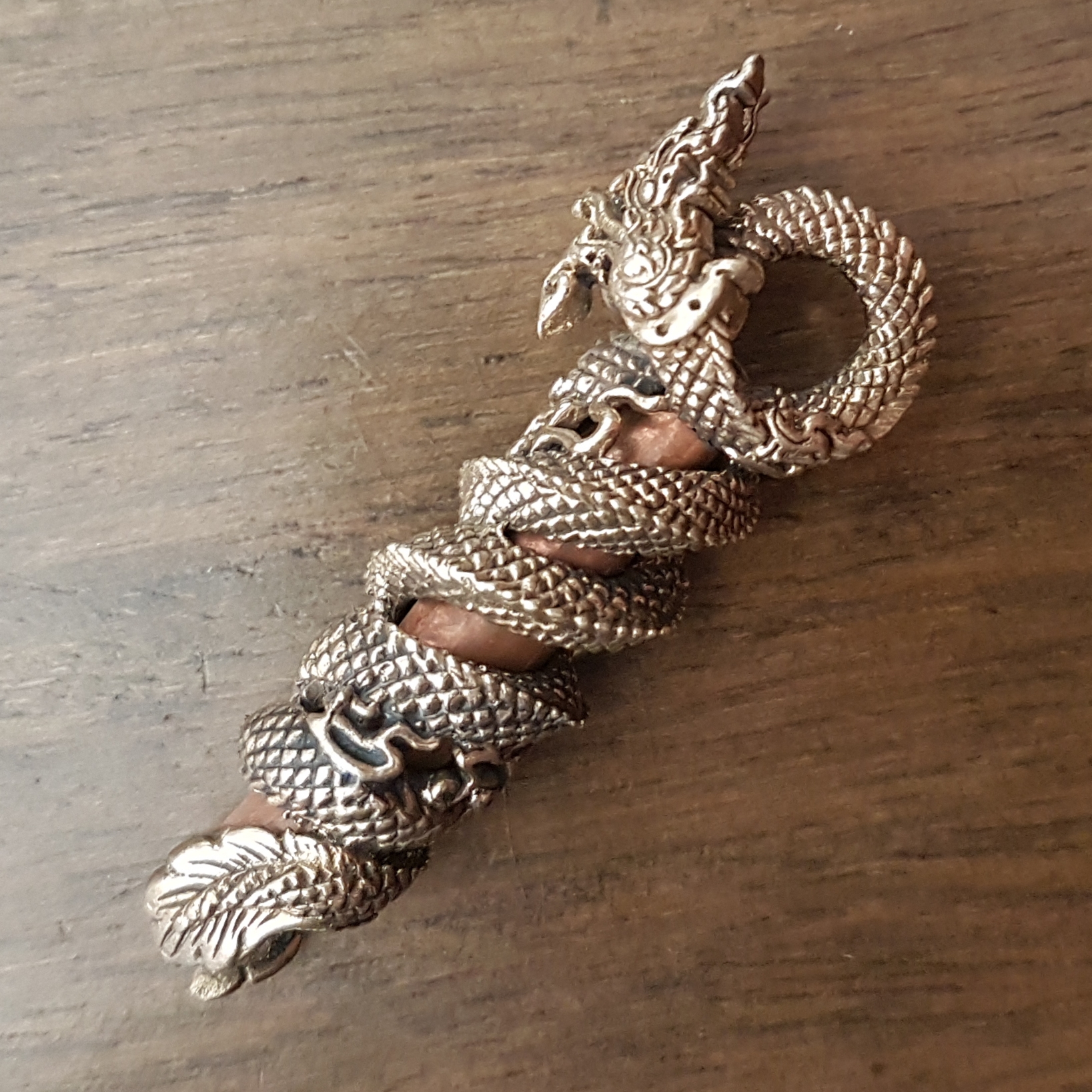 ตะกรุดนาคเกี้ยว (อัลปาก้า) รุ่นไหว้ครู 53 หลวงปู่เณร วัดบ้านเกษตรทุ่งเศรษฐี จ.ร้อยเอ็ด