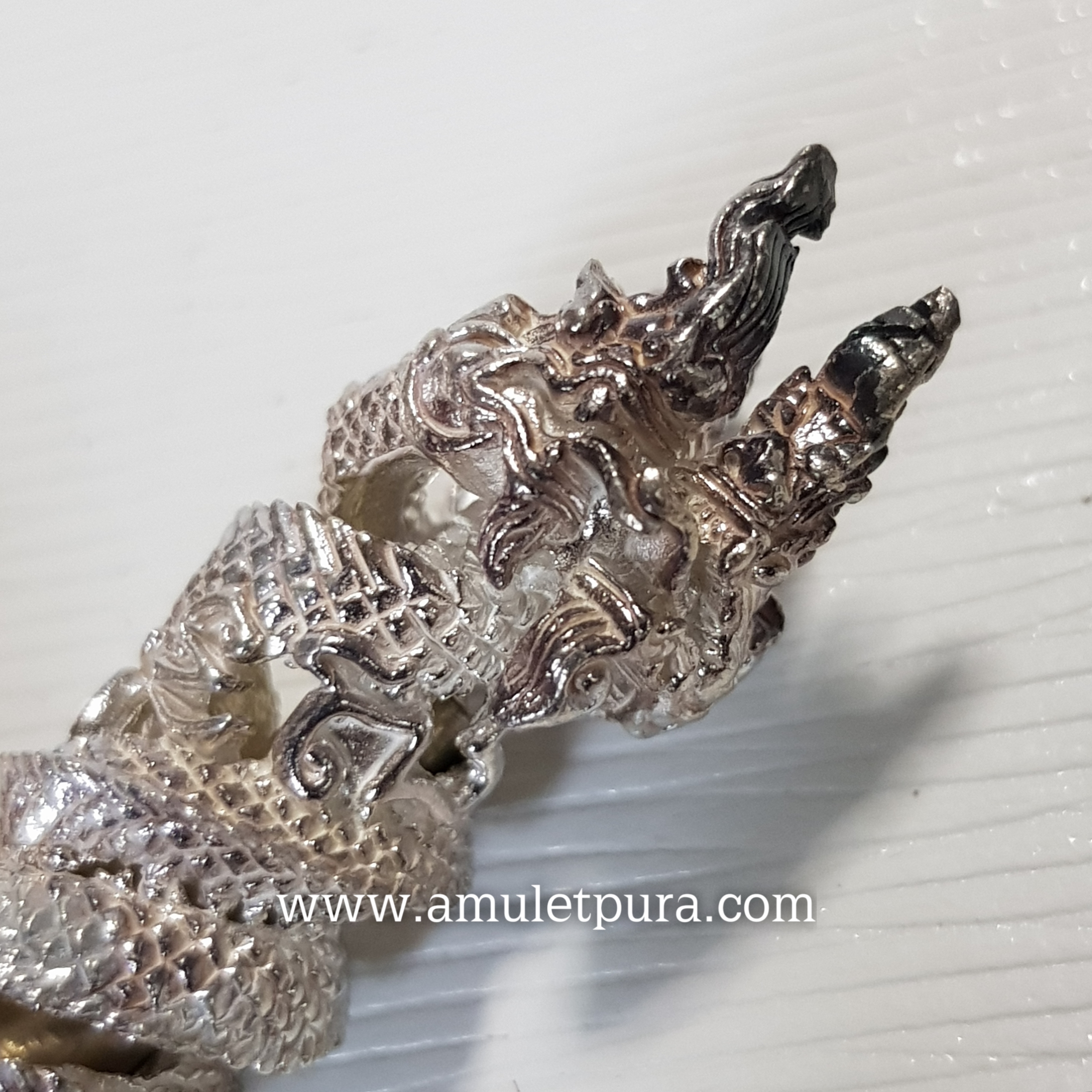 ตะกรุดนาคเกี้ยว(เงิน)รุ่นไหว้ครู53 หลวงปู่เณร วัดบ้านเกษตรทุ่งเศรษฐี จ.ร้อยเอ็ด