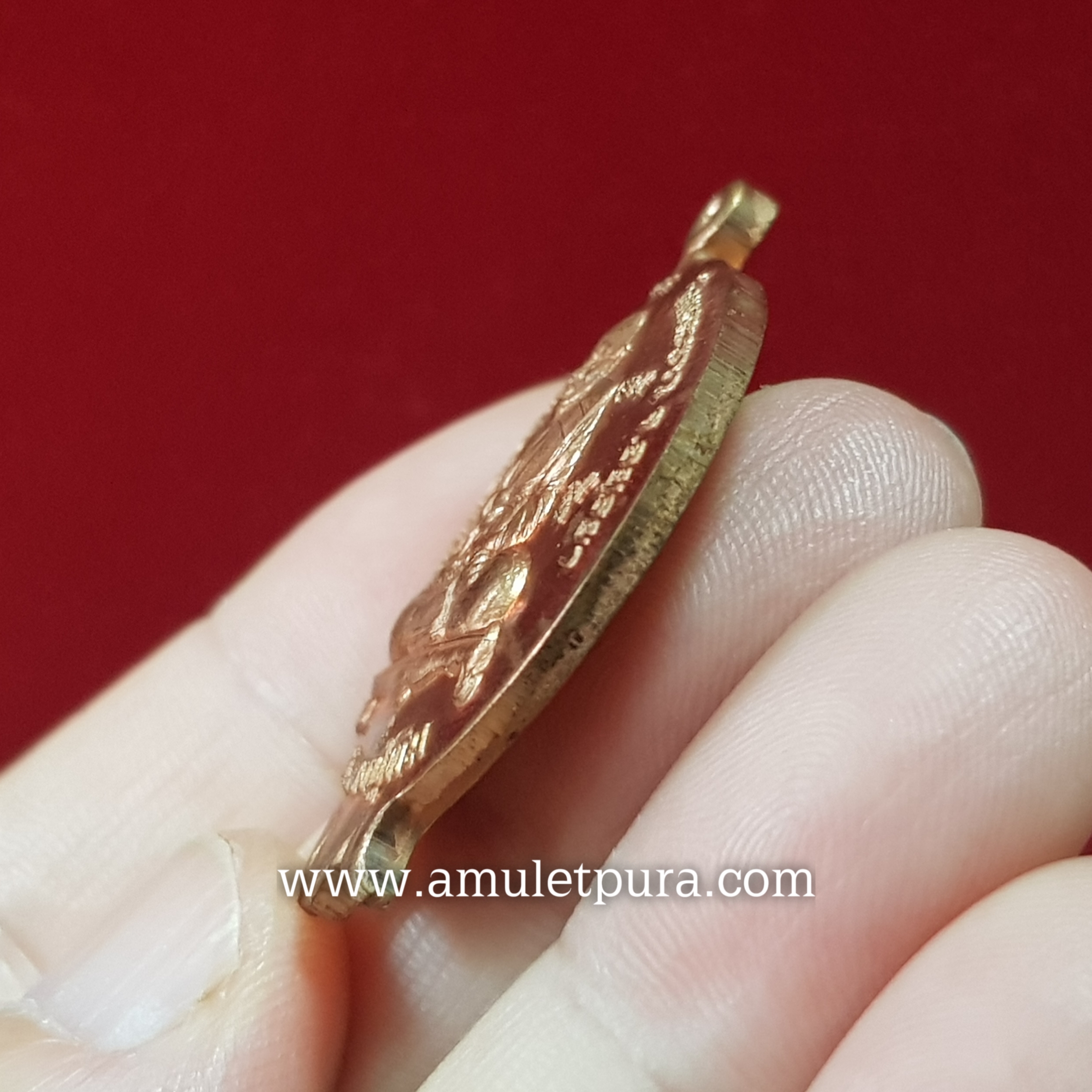 เหรียญผลทับทิมหลังสิงห์มหาอำนาจ(ทองแดงนอก)ปี46 หลวงปู่ทิม วัดพระขาว จ.พระนครศรีอยุธยา(หน้าเหรียญ ตอกโค้ดหยดน้ำ ตัว นะ)พร้อมเลี่ยมกันน้ำ