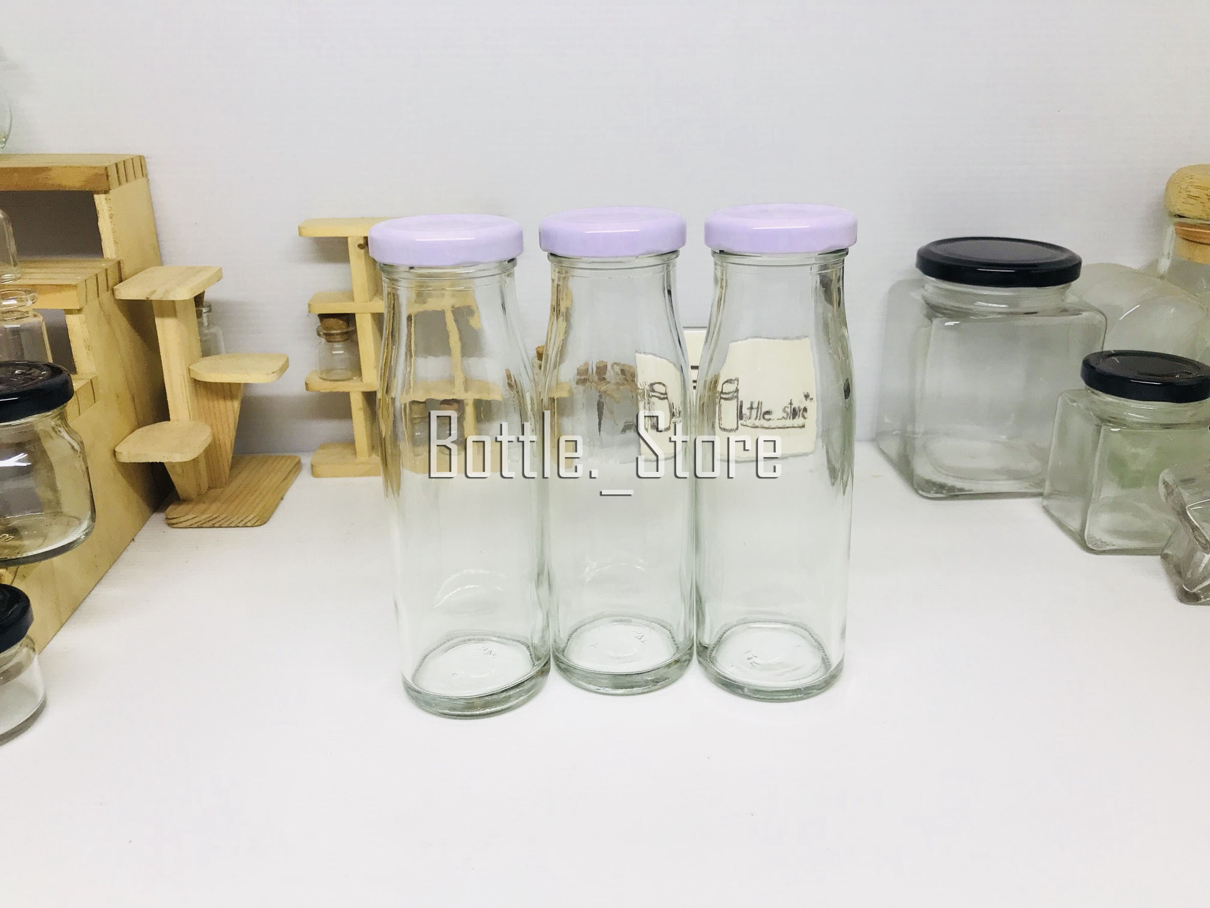 ขวดน้ำผลไม้ 200ml ฝาเกลียวล็อคสีขาว