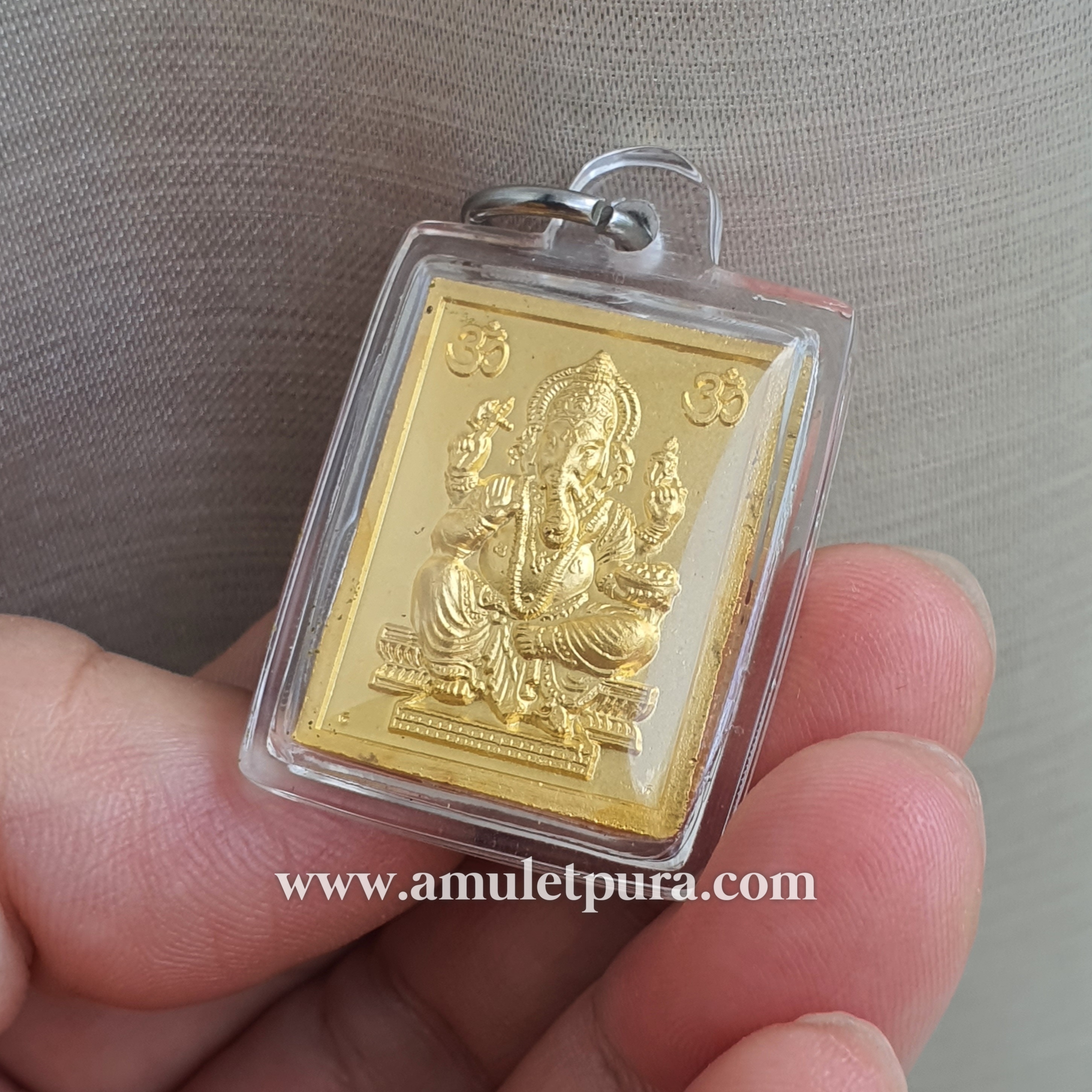 เหรียญแสตมป์ พระมหาเทพมุนีนอโมหลังพระพิฆเนศ (กะไหล่ทองลงยา) ปี52 พ่อท่านชม วัดศาลาไพ จ.นครศรีธรรมราช (พร้อมเลี่ยมกันน้ำ)