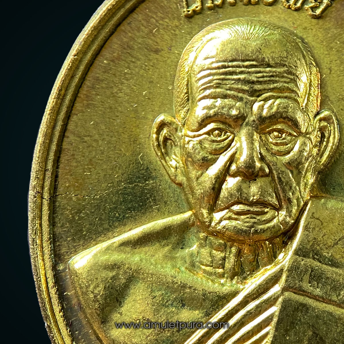 เหรียญโภคทรัพย์ หลังครุฑ เนื้อทองทิพย์ รุ่นแรก ปี54 หลวงปู่ผาด วัดไร่ จ.อ่างทอง (มีโค้ด หมายเลข 761)