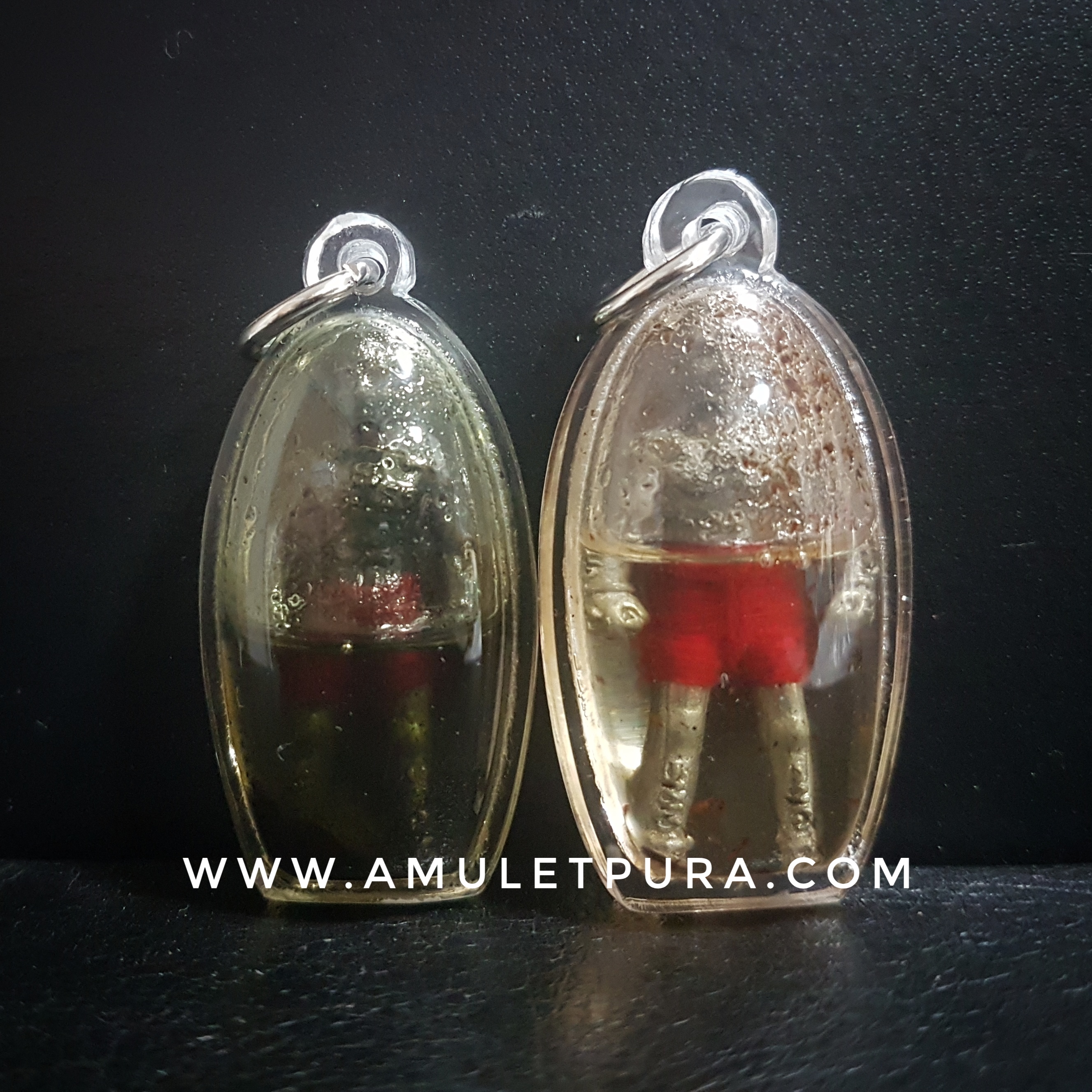 หุ่นพยนต์นำโชค (เนื้อตะกั่วโบราณ แช่น้ำมันว่านเทพรัญจวน) รุ่นบารมีพ่อปู่ ปี51 หลวงปู่เณร วัดบ้านเกษตรทุ่งเศรษฐี จ.ร้อยเอ็ด