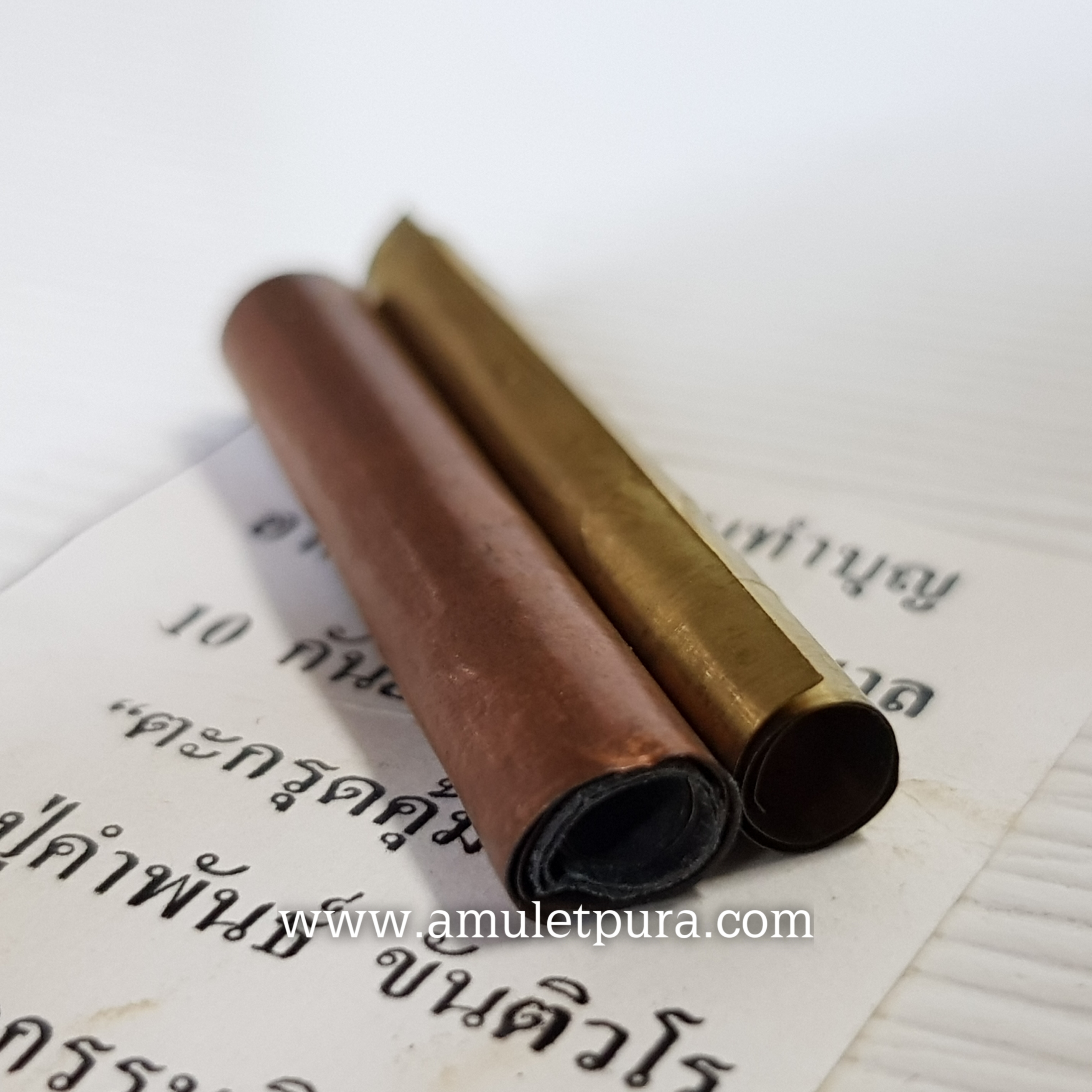 ตะกรุดคุ้มภัย หลวงปู่คำพันธ์ ขันติวโร ที่ระลึกงานทำบุญอาคารสถานพยาบาล ปี50