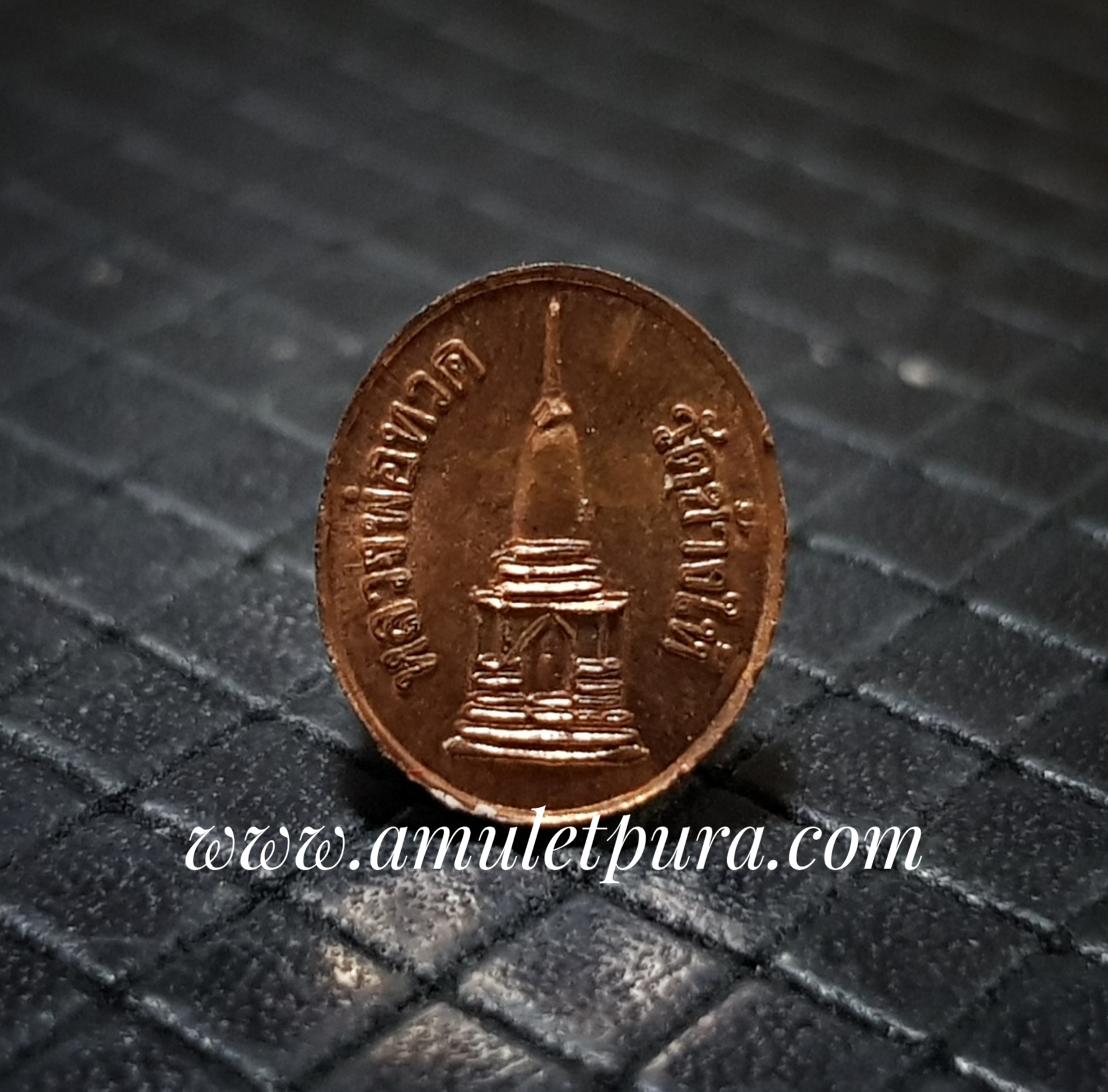 เม็ดแตงหลวงพ่อทวด (ทองแดง) วัดช้างให้ จ.ปัตตานี