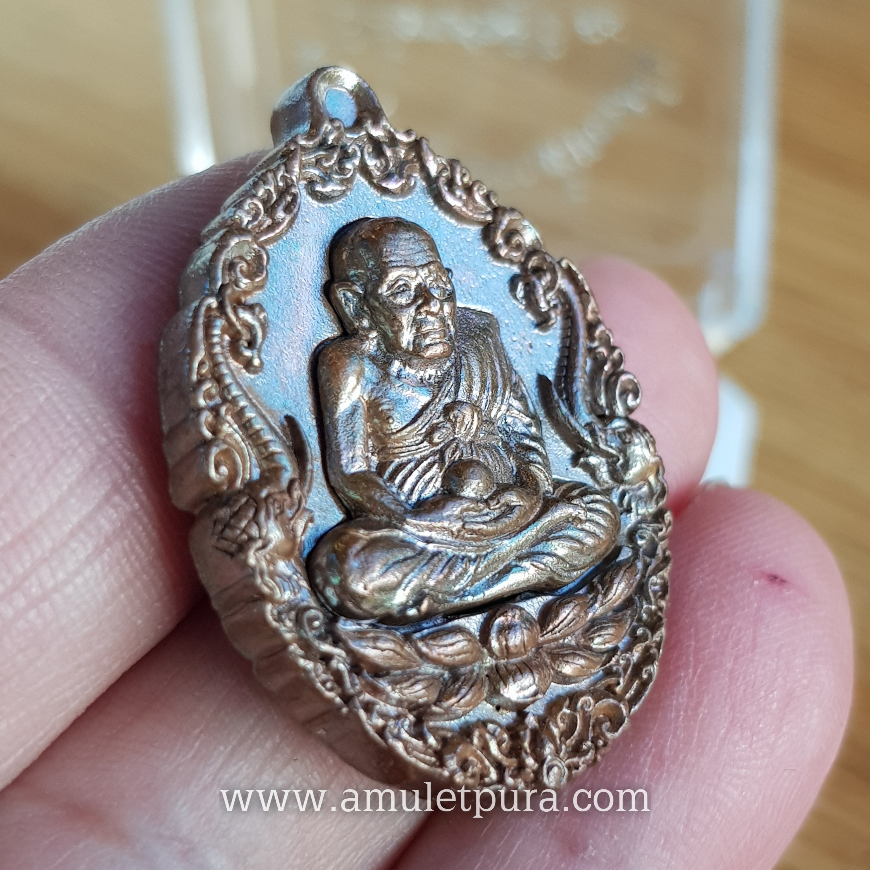 เหรียญหล่อหลวงปู่ทวดบรรจุกริ่ง เนื้อทองแดงผิวไฟ รุ่นเปิดโลกเศรษฐี58 วัดพระมหาธาตุฯ จ.นครศรีธรรมราช (ตอกโค้ด หมายเลข 1518)