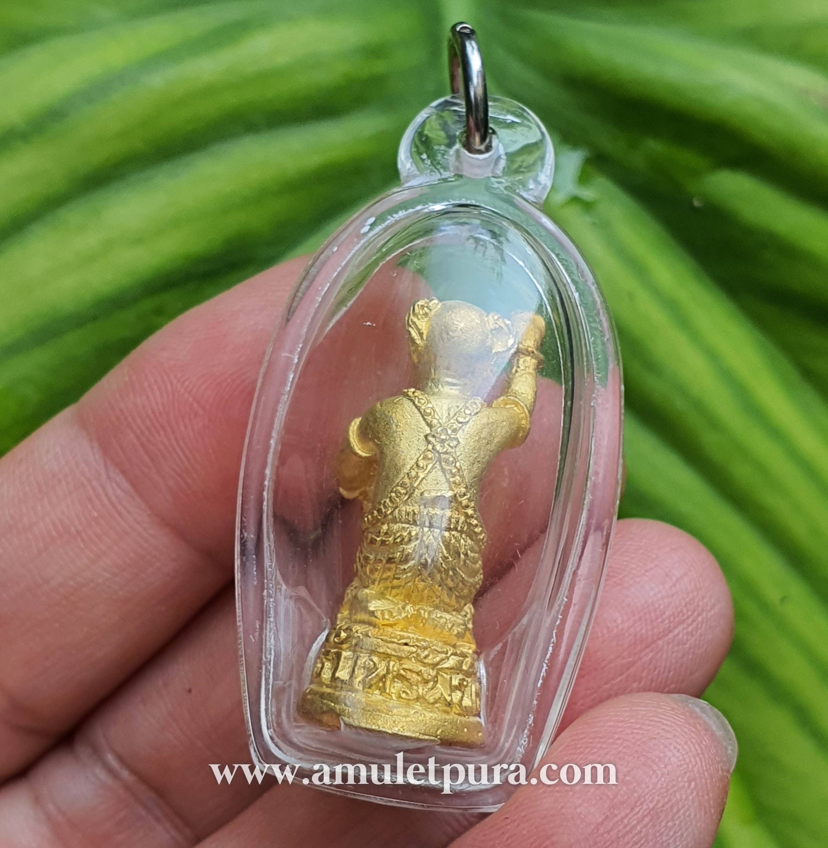 กุมารเพชรรับทรัพย์ รุ่นรับทรัพย์ (โลหะชุบทองปัดเงา) ปี45 หลวงปู่ชื่น วัดตาอี จ.บุรีรัมย์ (ใต้ฐาน ตอกโค้ด อุดผง ฝังตะกรุดเงิน พร้อมเลี่ยมกันน้ำ)