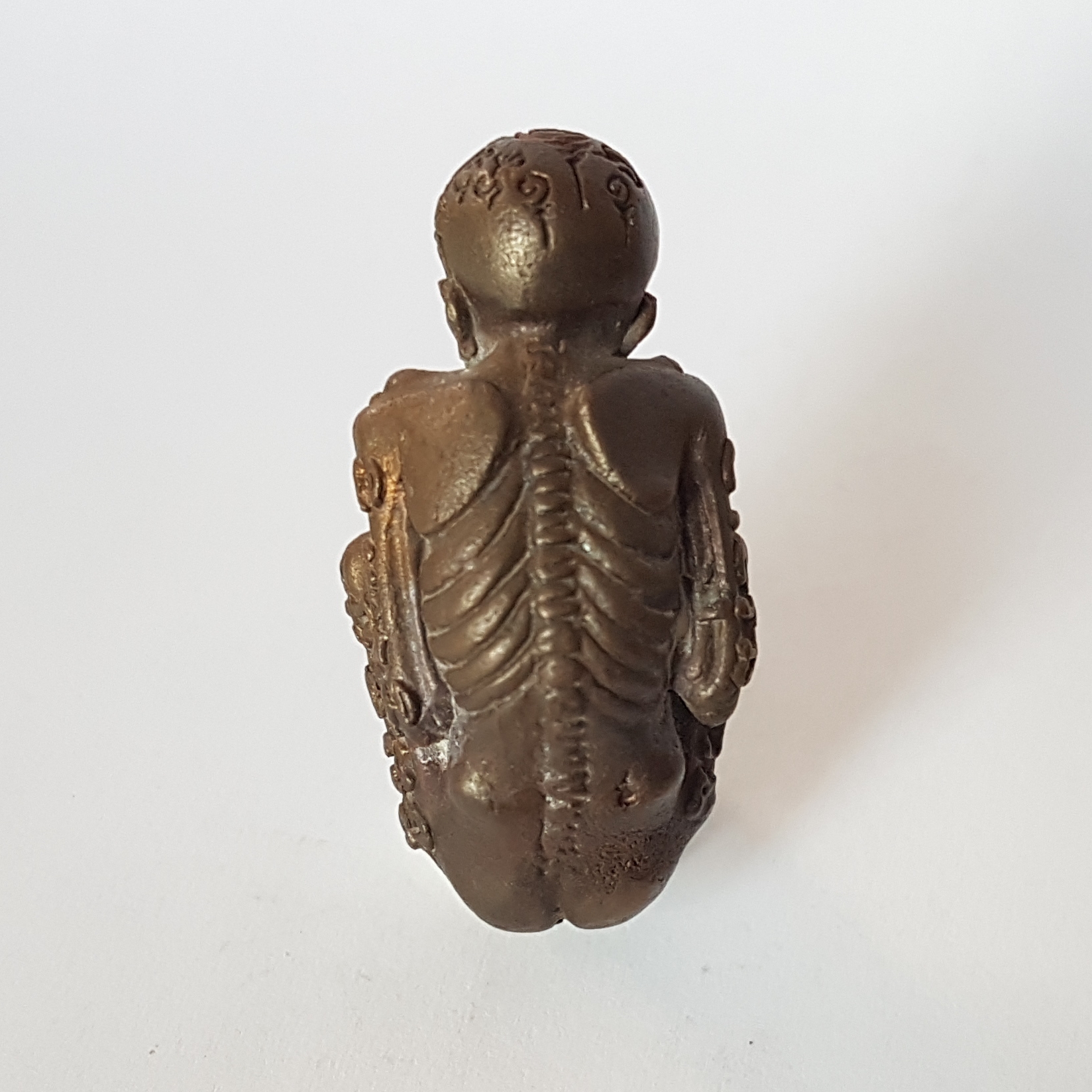 ลูกกรอก รุ่นแรก(ชนวนโลหะ ก้นอุดผงพราย)หลวงพ่อปิ่น วัดหนองเกษร จ.ราชบุรี