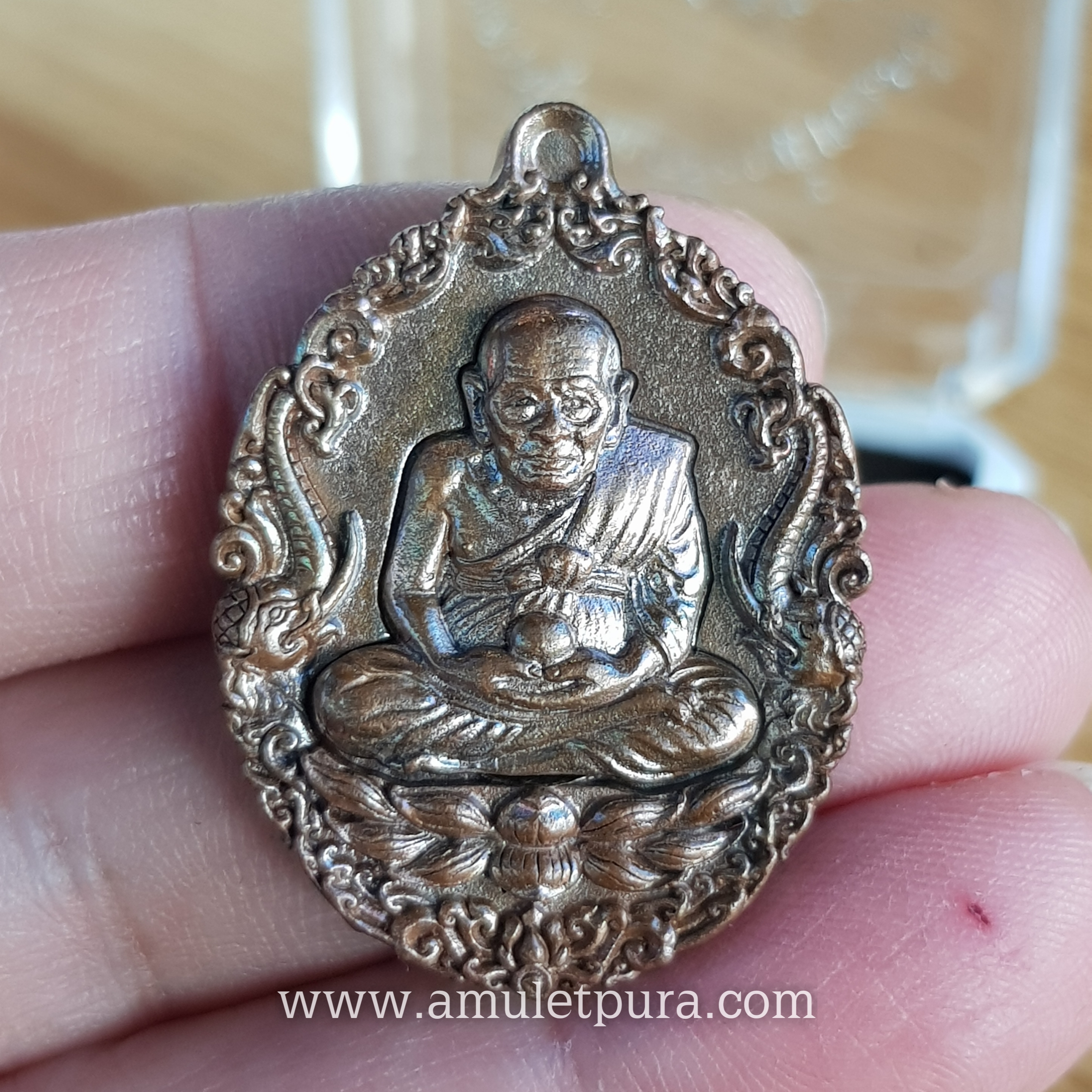 เหรียญหล่อหลวงปู่ทวดบรรจุกริ่ง เนื้อทองแดงผิวไฟ รุ่นเปิดโลกเศรษฐี58 วัดพระมหาธาตุฯ จ.นครศรีธรรมราช (ตอกโค้ด หมายเลข 1518)