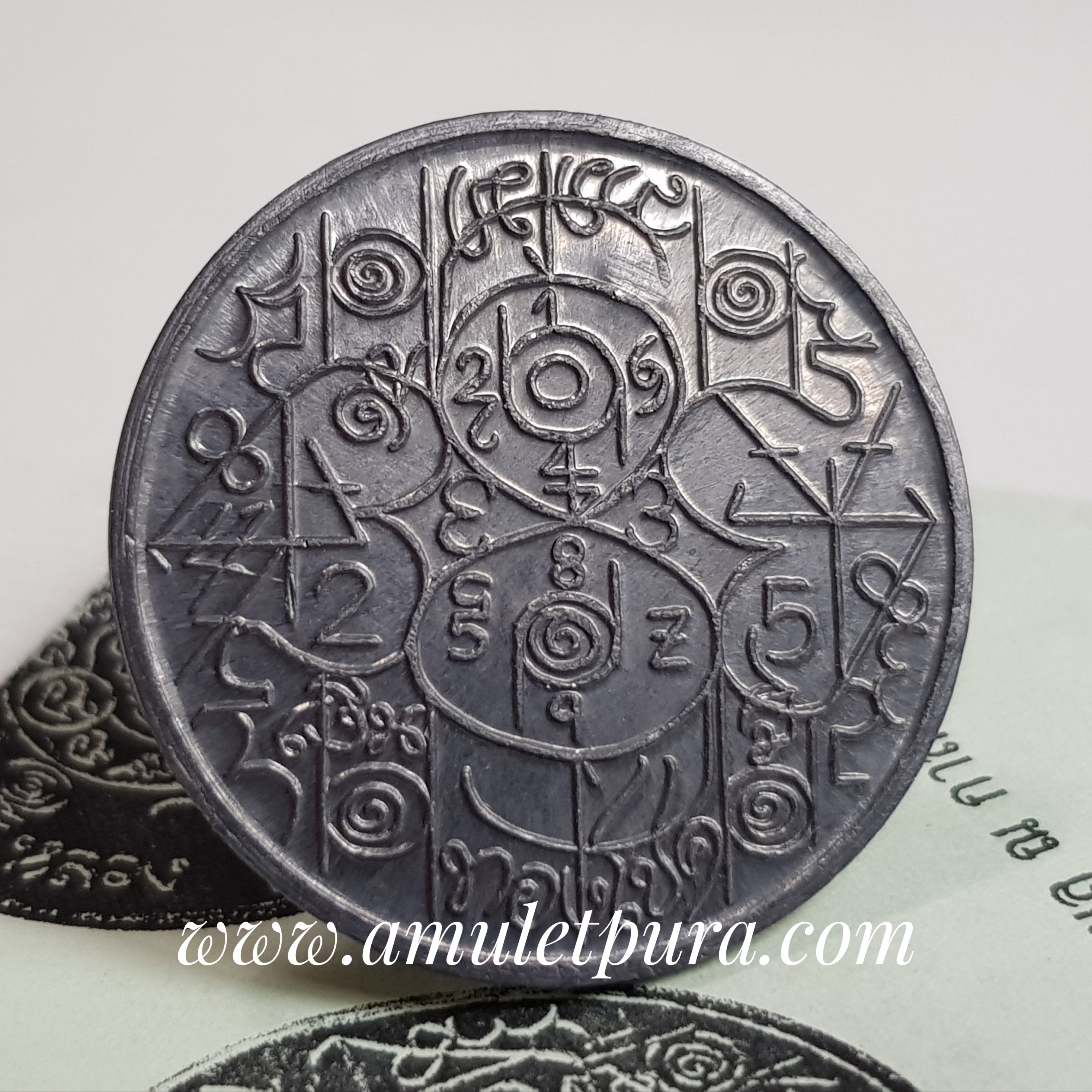 เหรียญเลขศาสตร์(เหรียญให้หวย)รุ่นแรก ตะกั่ว หลวงตาช้วน วัดขวาง สุพรรณบุรี(ตอกโค้ด)