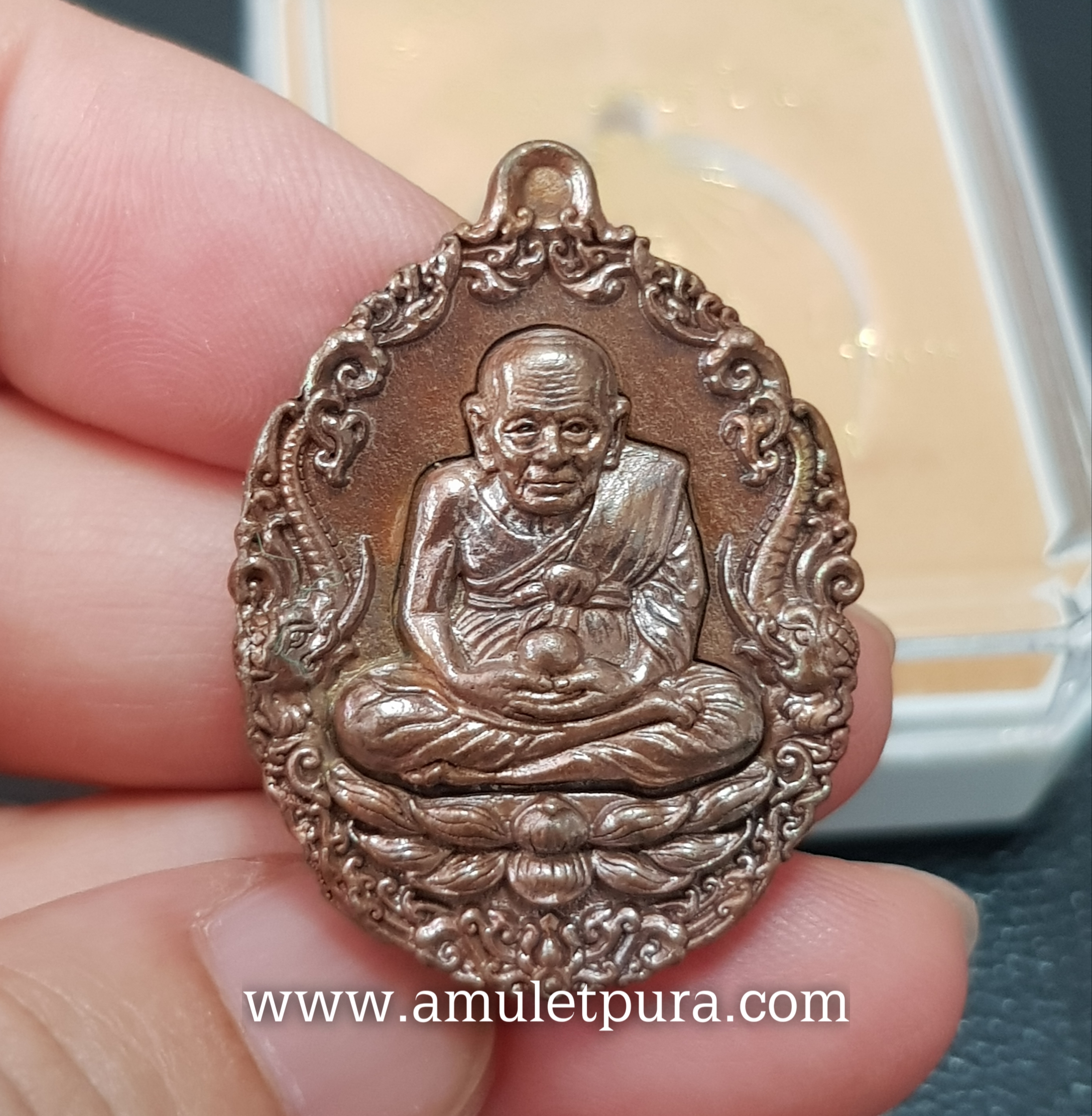 เหรียญหล่อหลวงปู่ทวดบรรจุกริ่ง เนื้อทองแดงผิวไฟ รุ่นเปิดโลกเศรษฐี58 วัดพระมหาธาตุฯ จ.นครศรีธรรมราช (ตอกโค้ด หมายเลข 1691)