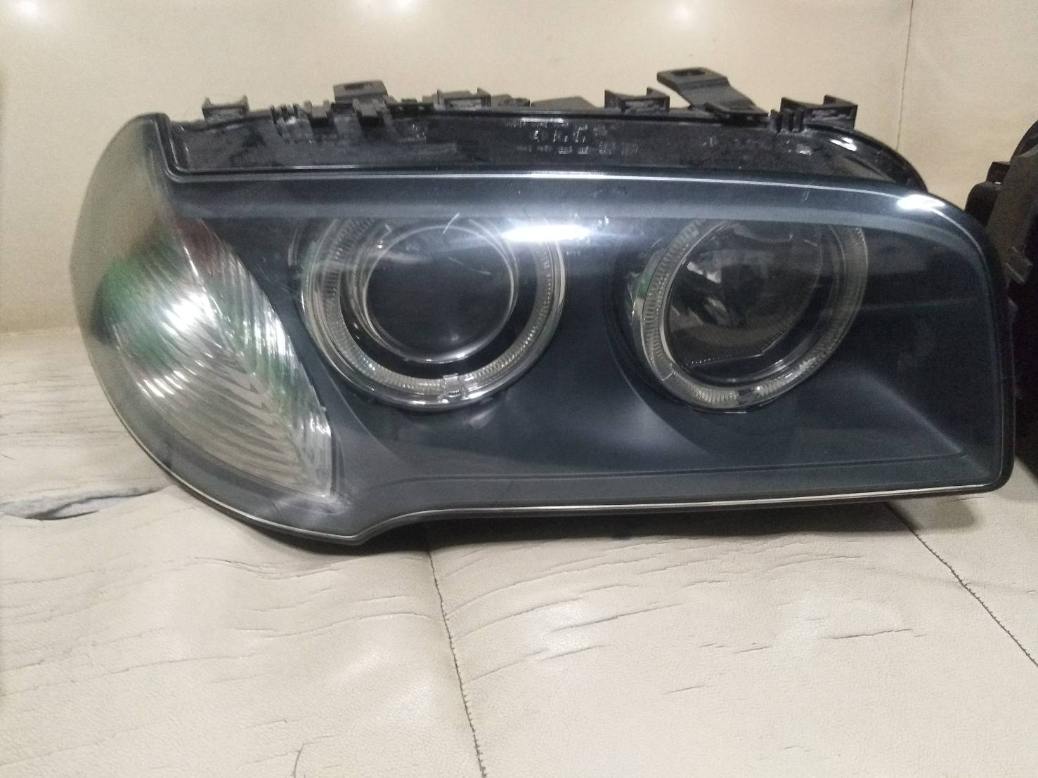 เสื้อไฟหน้า BMW X3 XENON R (ขวา)