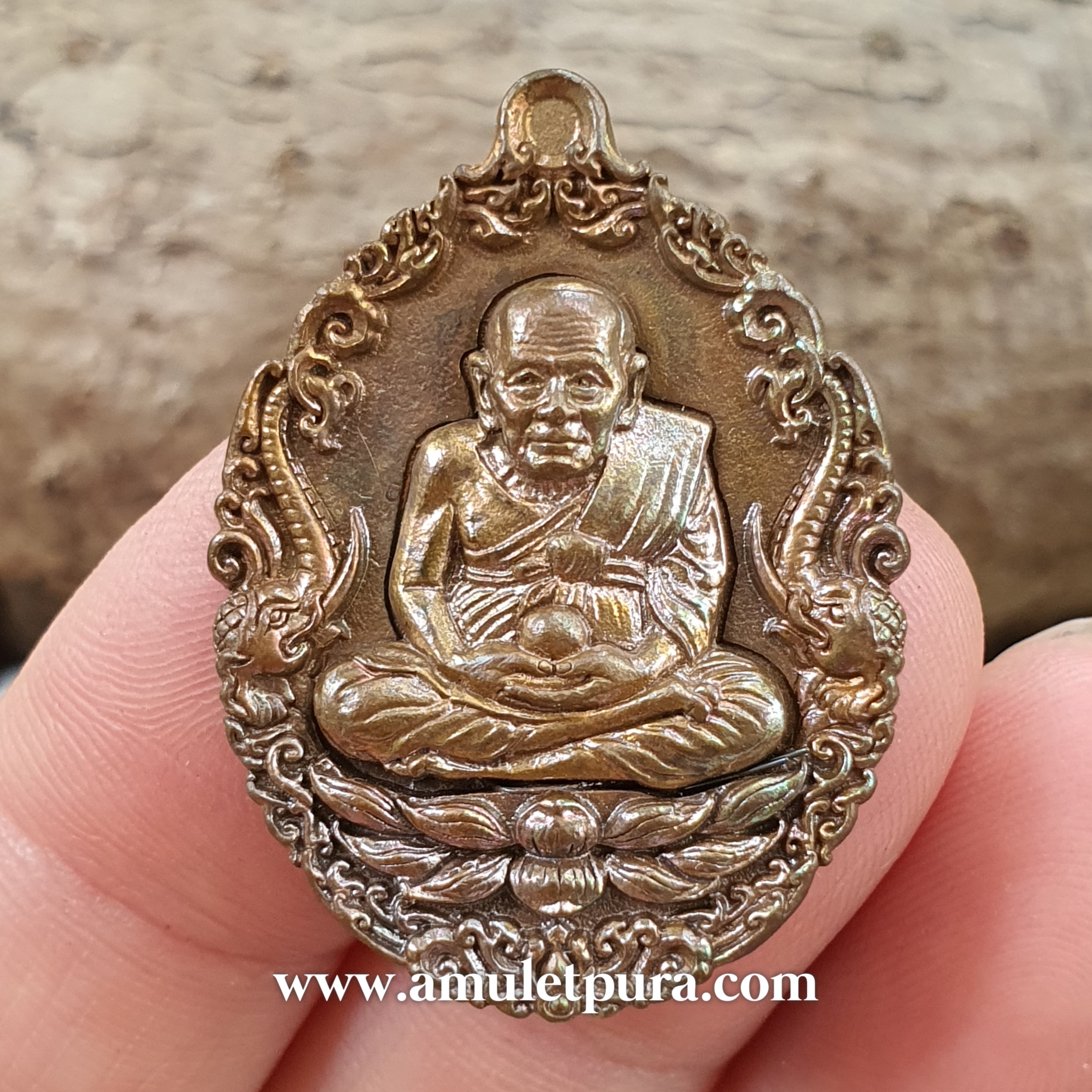 เหรียญหล่อหลวงปู่ทวดบรรจุกริ่ง(ทองแดงผิวไฟ)รุ่นเปิดโลกเศรษฐี58 วัดพระมหาธาตุฯ จ.นครศรีธรรมราช(ตอกโค้ด หมายเลข1562)