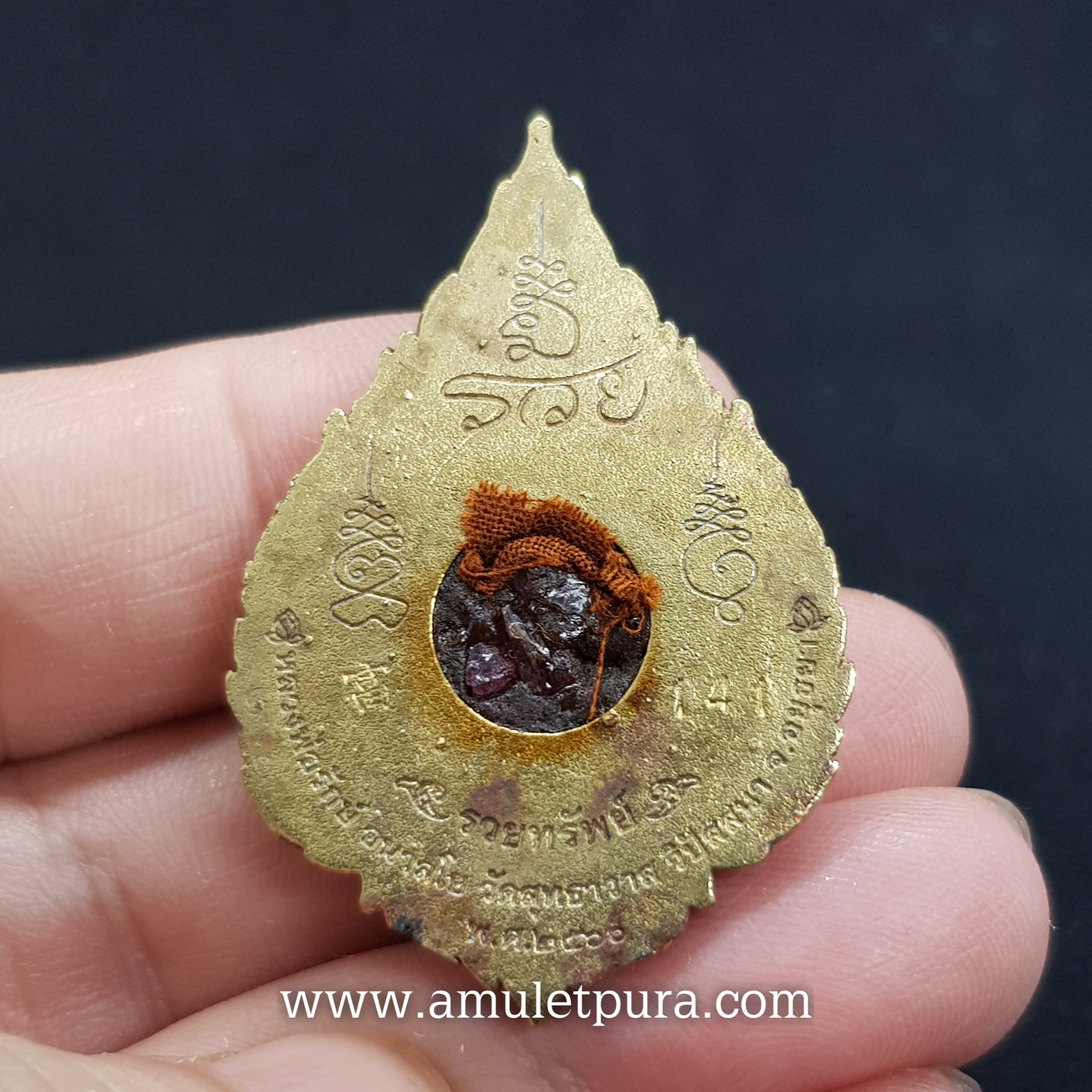 พระราหู รุ่นรวยทรัพย์(ชนวนทองทิพย์)ปี60 หลวงพ่อรักษ์ วัดสุทธาวาสวิปัสนา จ.พระนครศรีอยุธยา(อุดชันโรง พลอยแดงเสก และจีวร มีโค้ด หมายเลข141 จัดสร้าง 599 องค์)