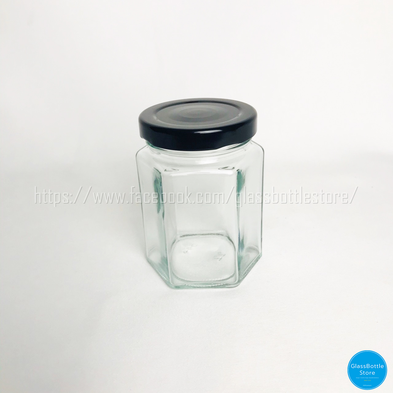 ขวดแก้ว หกเหลี่ยม 180ml ฝาเกลียวล็อคสีดำ