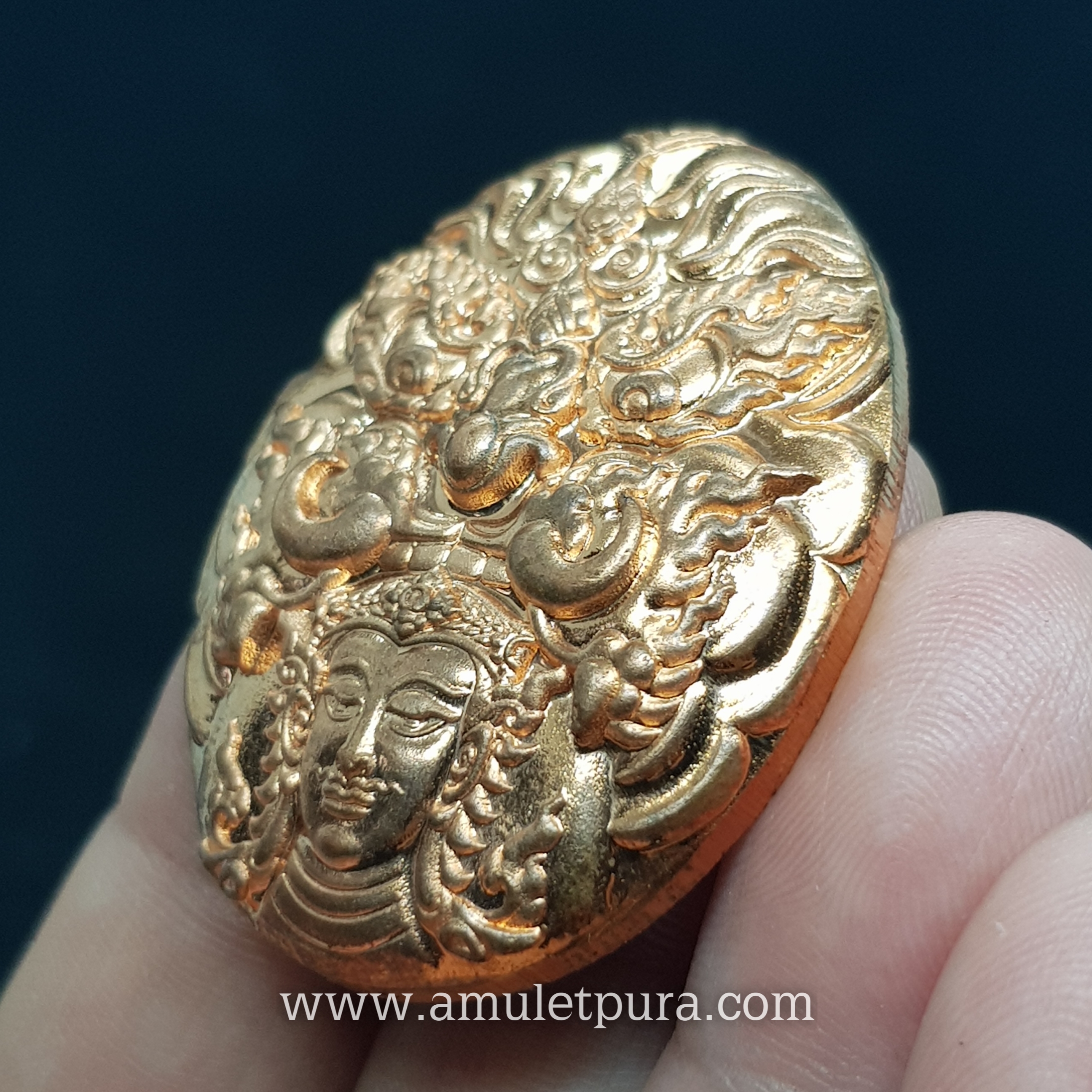 เหรียญหน้ากากเทพพญาราหูคุ้มดวง (เนื้อสัมฤทธิ์แดง) รุ่นเจริญทรัพย์ ปี56 พระอาจารย์ประสูติ วัดในเตา จ.ตรัง