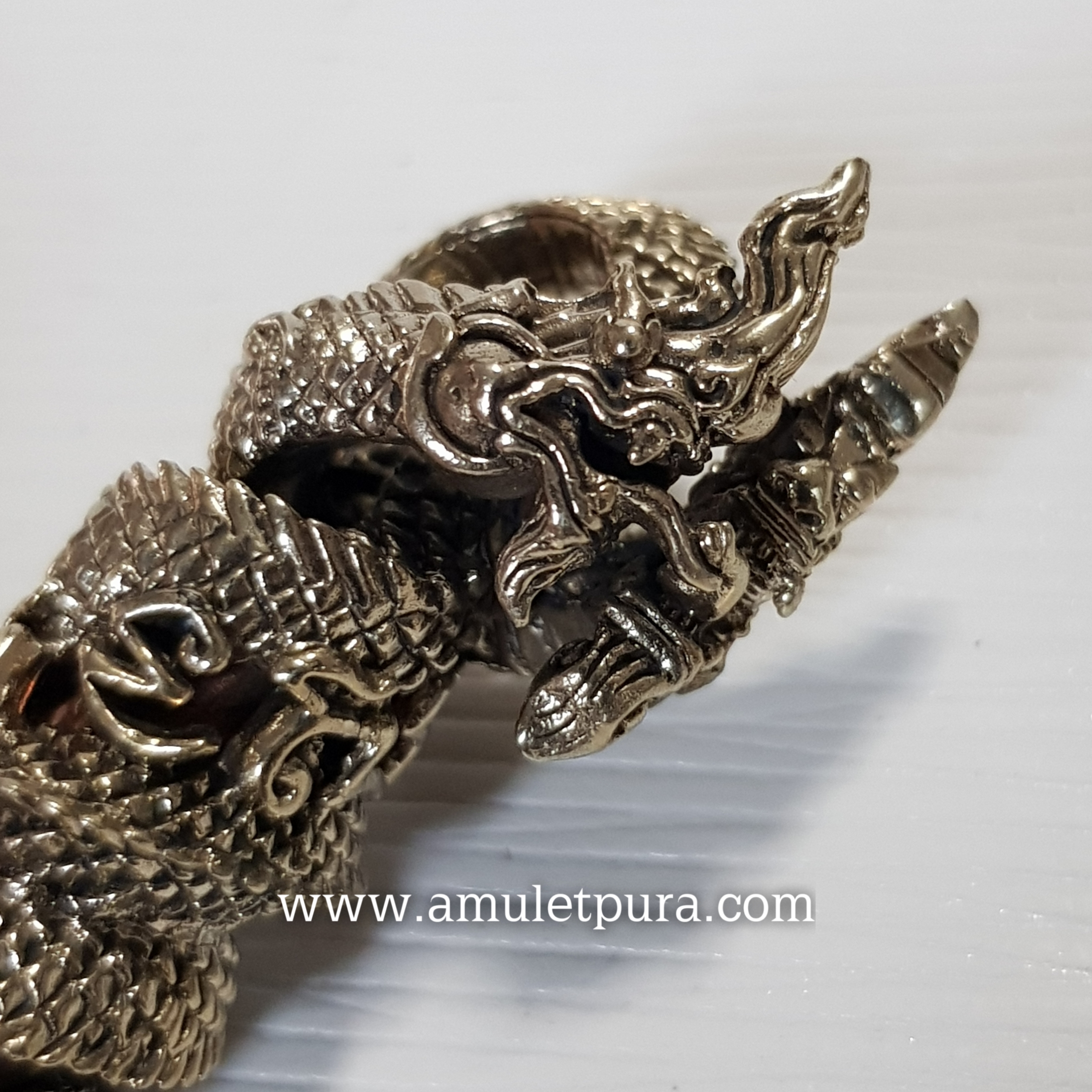 ตะกรุดนาคเกี้ยว (อัลปาก้า) รุ่นไหว้ครู 53 หลวงปู่เณร วัดบ้านเกษตรทุ่งเศรษฐี จ.ร้อยเอ็ด