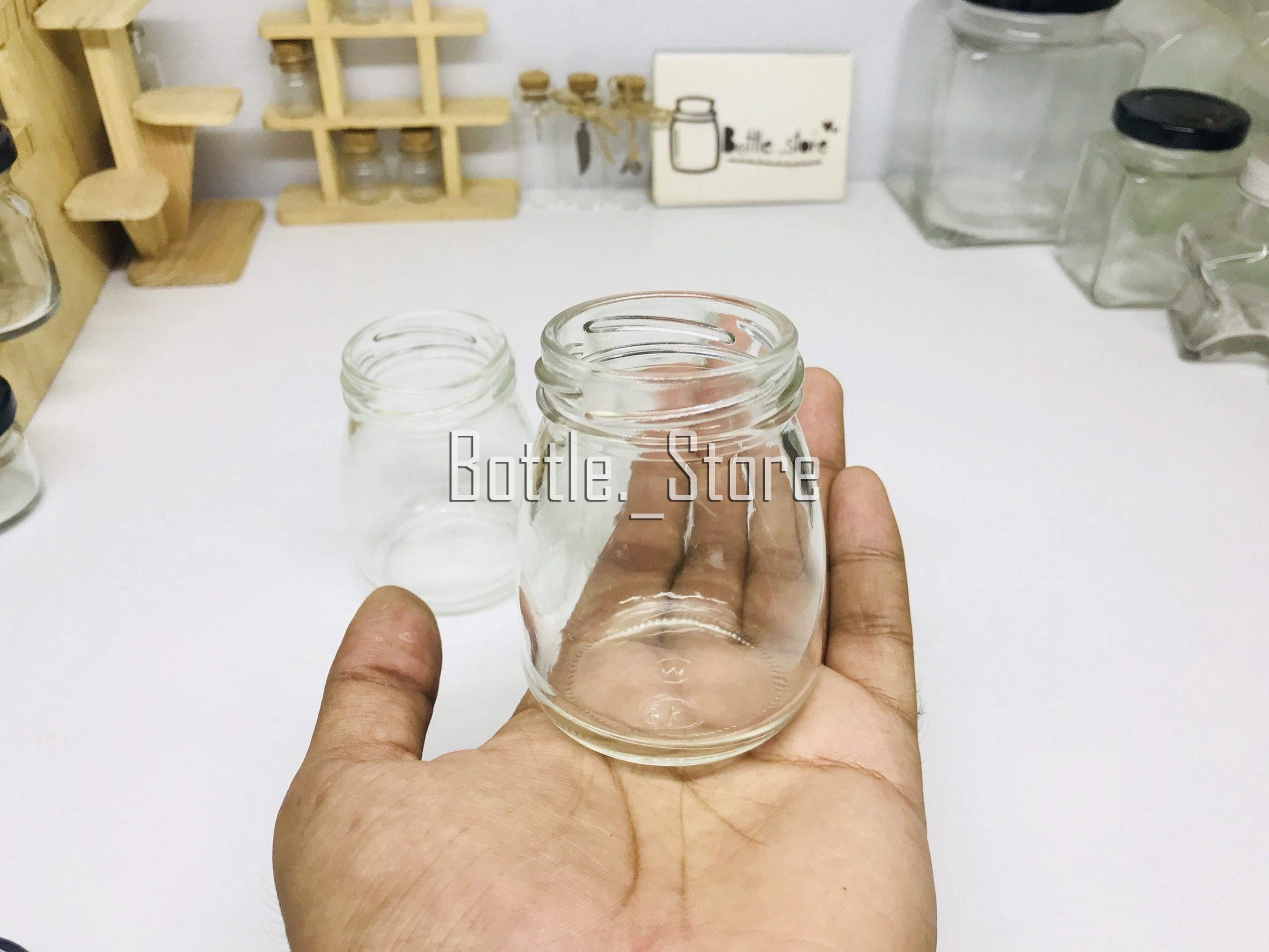 ขวดแก้ว พุดดิ้ง 100ml ฝาเกลียวล็อคสีดำ