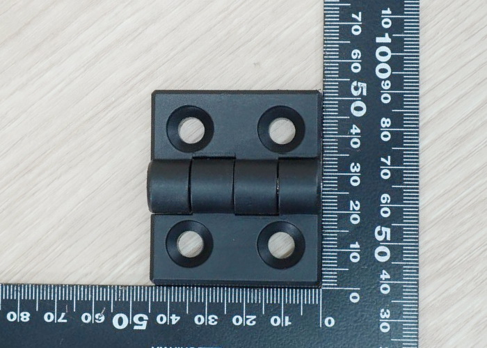 บานพับพลาสติกไนลอน Hinge for Alu-Profile 3030 ระยะรู 30x23 mm