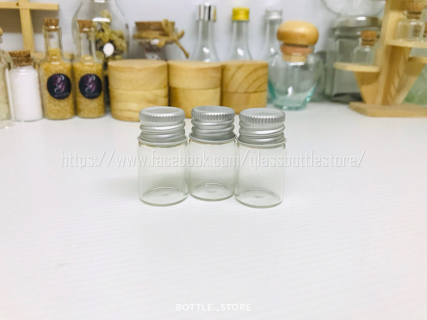 ขวดแก้ว กลม 5ml สีใสฝาเงิน