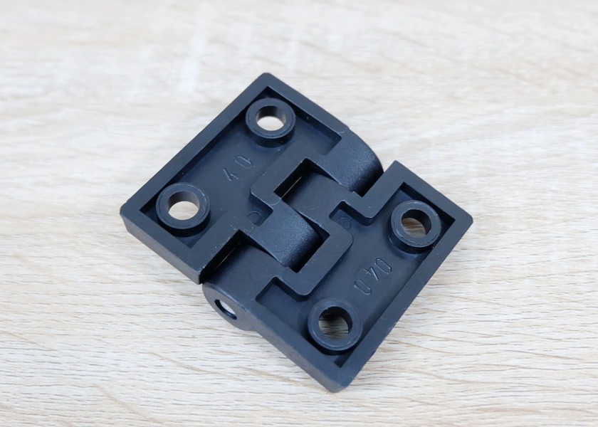บานพับพลาสติกไนลอน Hinge for Alu-Profile 4040 ระยะรู 40x30 mm