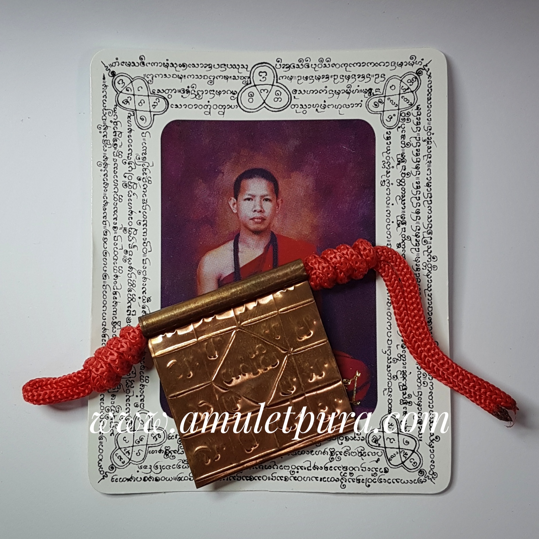 ตะกรุดแผ่นยันต์หนีบพิศวาส มหาเสน่ห์ พระอธิการมนตรี(พระครูบาน้อย)วัดพระธาตุสุโทนมงคลคีรี จ.แพร่