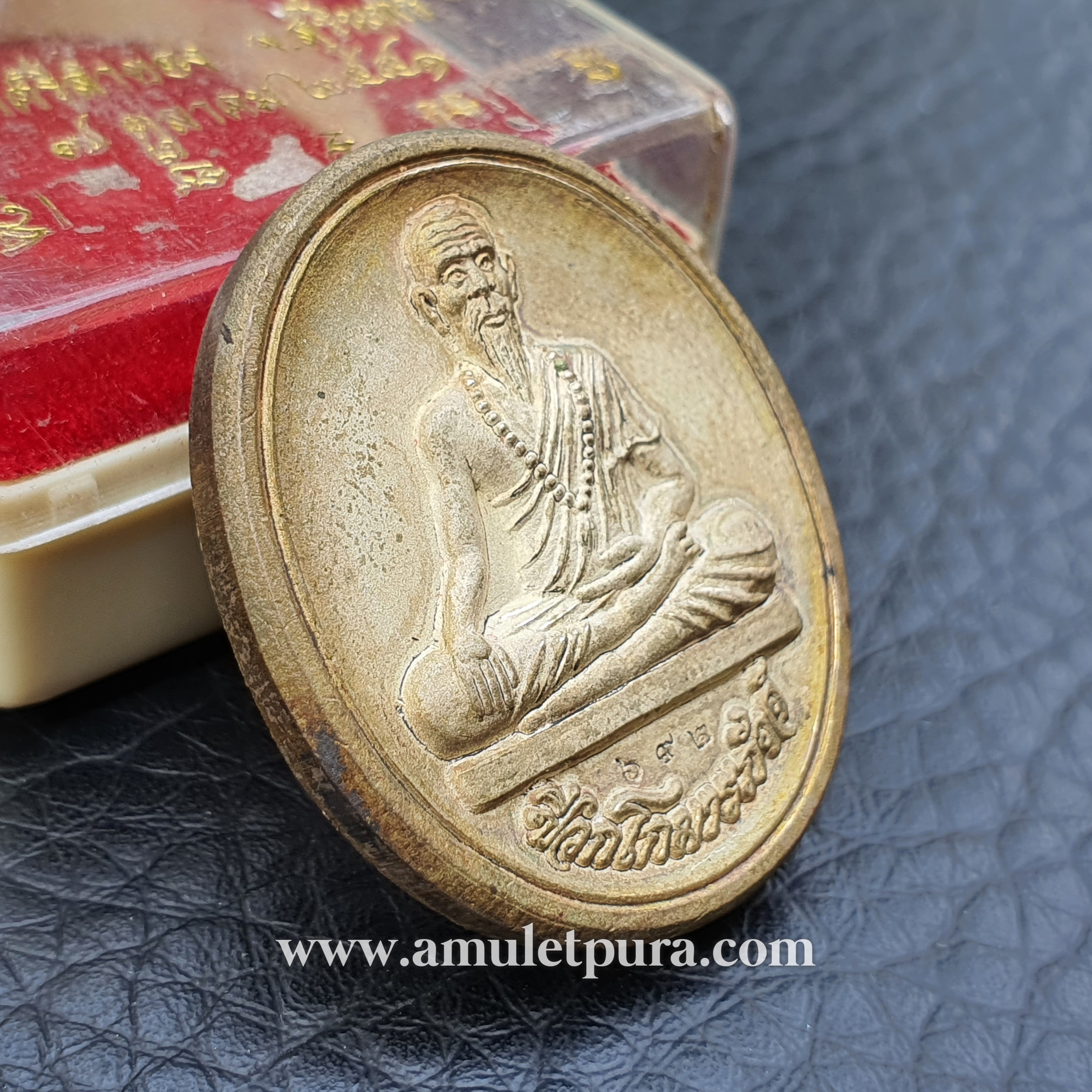 เหรียญหมอชีวกโกมารภัจจ์ หลังพระพิฆเณศ(สัมฤทธิ์ชุบเงินพ่นทราย)รุ่นเศรษฐี 1,000 ล้าน ปี51 หลวงปู่คีย์ วัดศรีลำยอง จ.สุรินทร์ (ตอกโค้ด หมายเลข 692)